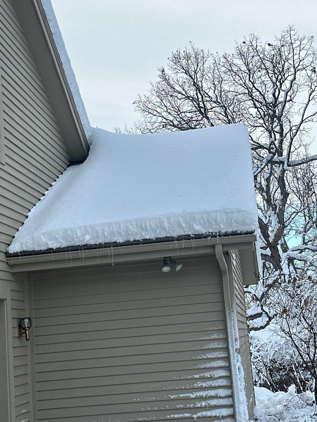 Roof Snow And Ice Dam Removal using Steamer by Stendahl Services