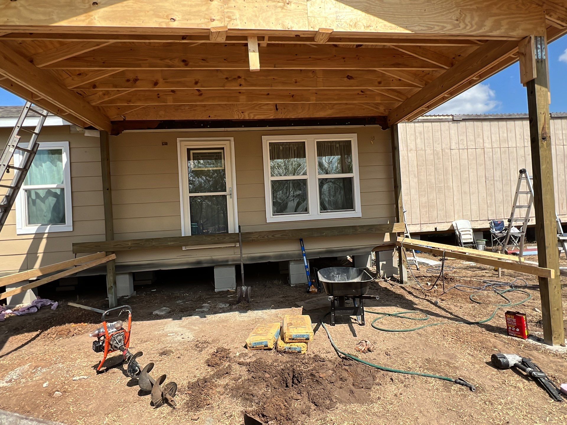 Front Porch Sitt'n by Bayfront Roofing and Construction