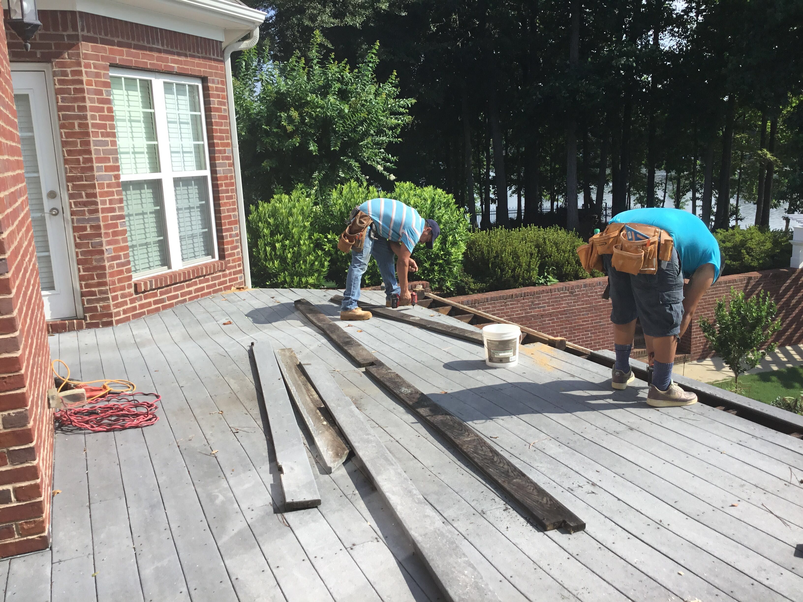Elevated Composite Deck and Screened Porch Construction in Newnan by Swift Home Renovations