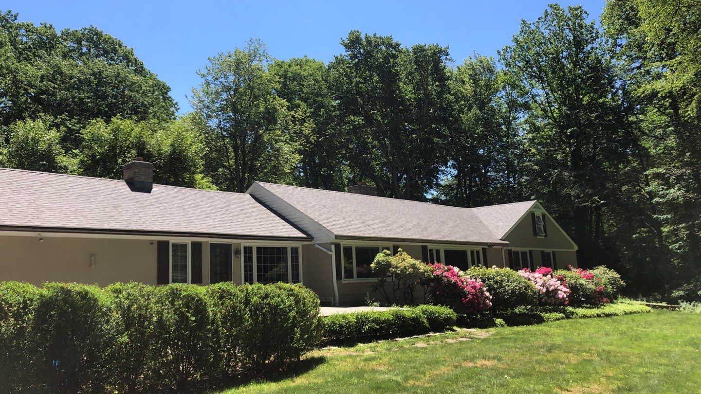 Commercial Roofing Installation using Owens Corning Duration Driftwood by A Plus Exterior