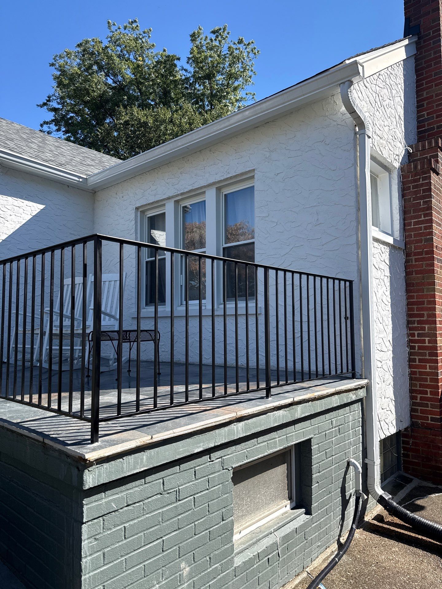 Custom Black Metal Porch and Step Railing Installation in Bethesda by Capitol Iron Works