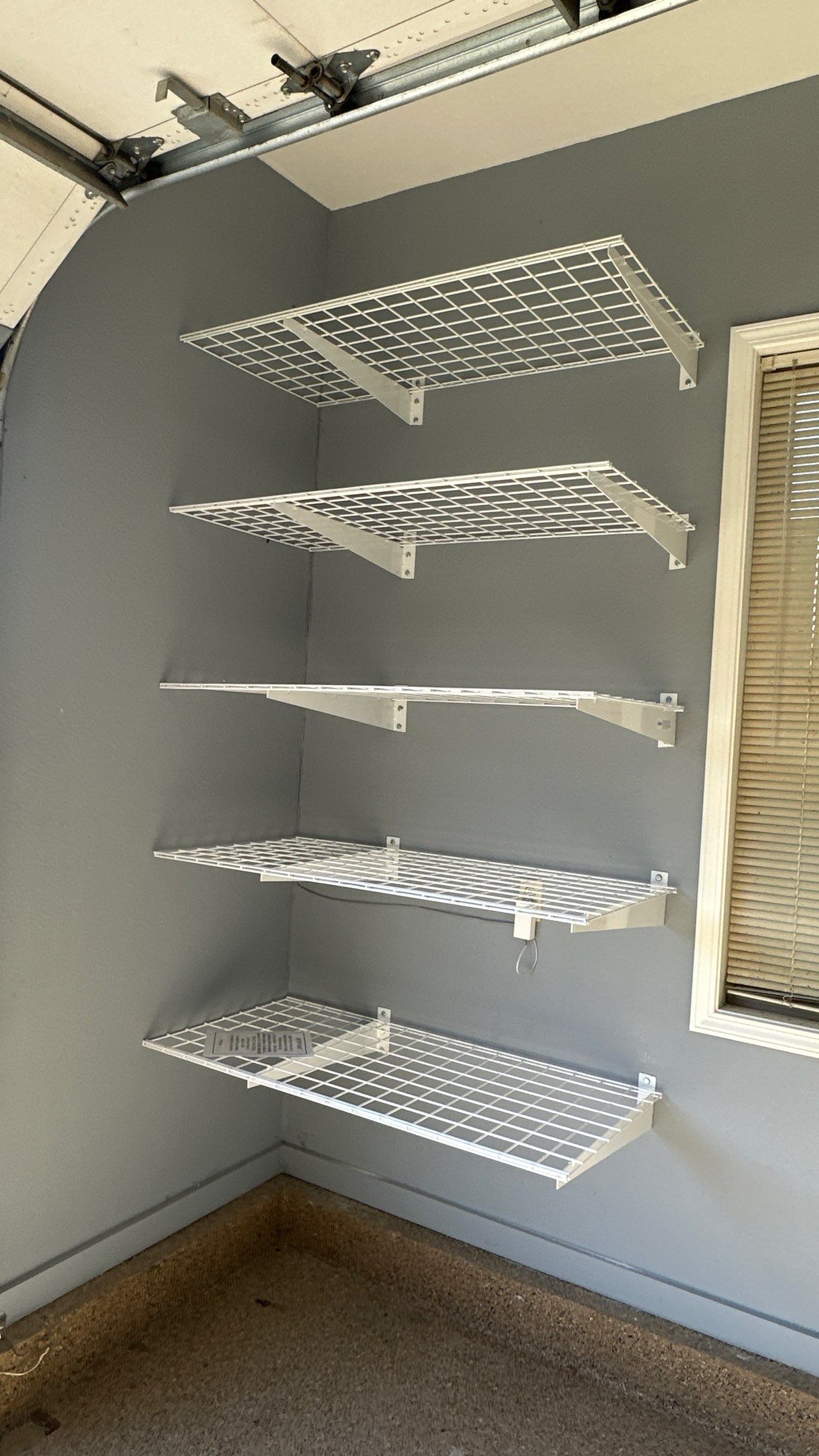 Julie G. trasnformd her garage with wall storage   by Banner Garage