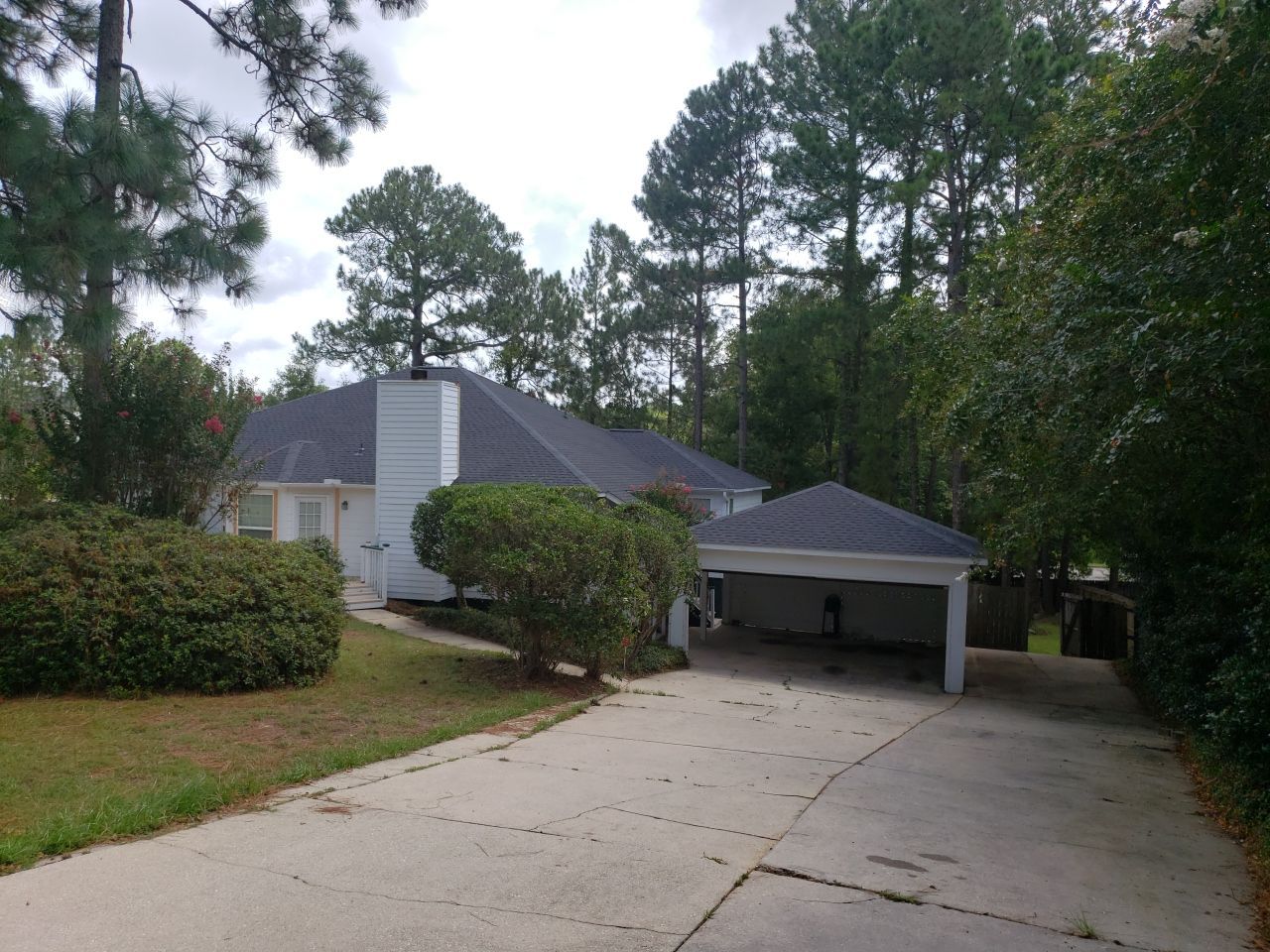 Residential Roofing Installation using Roof Replacement by American Roofing & Construction LLC