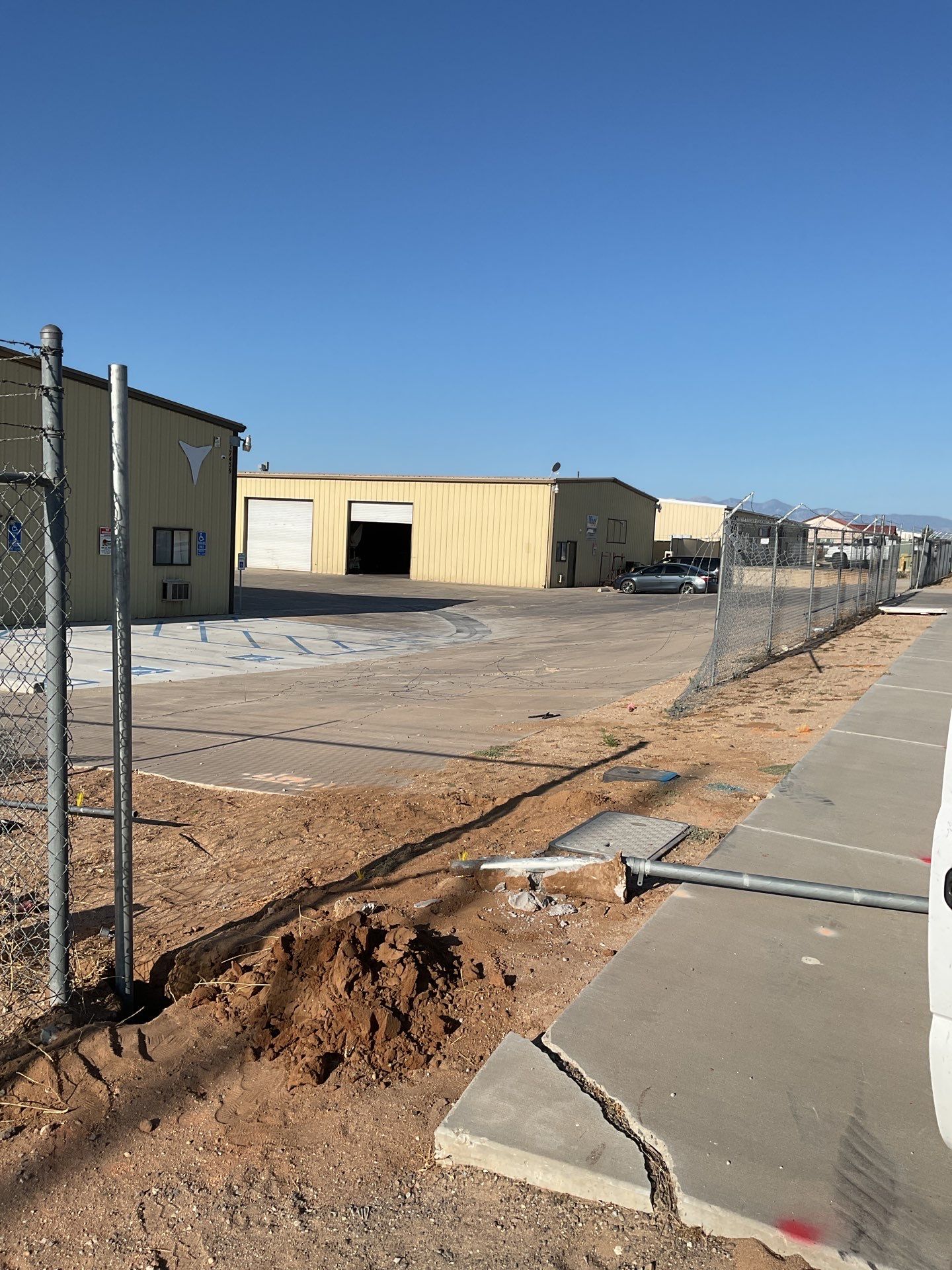 Commerical Fence Repair using Chain-Link with Barbed Wire by Fence Guys Inc. 