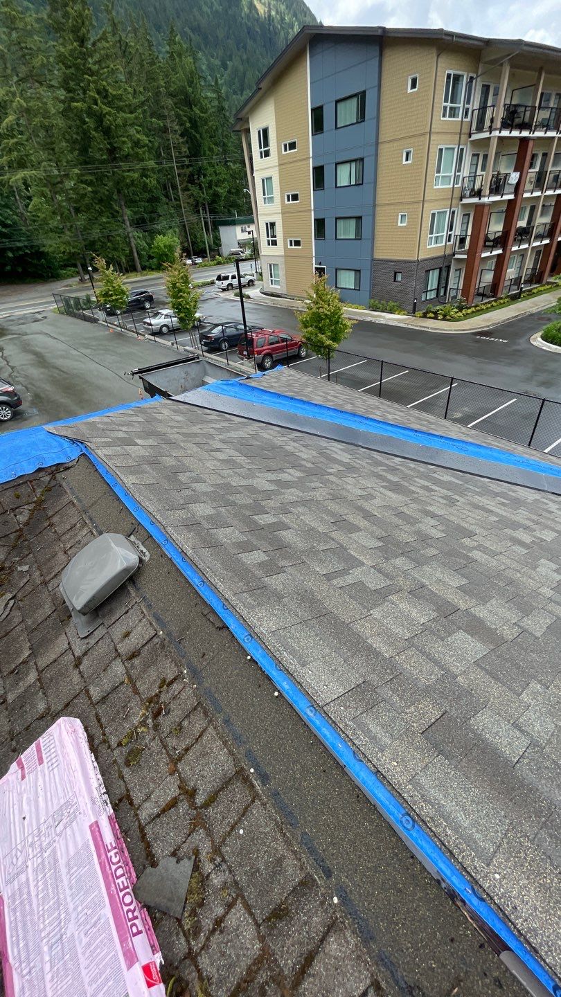 Residential ReRoofing Installation using OC Oakridge shingles by Top Notch Roofing Inc