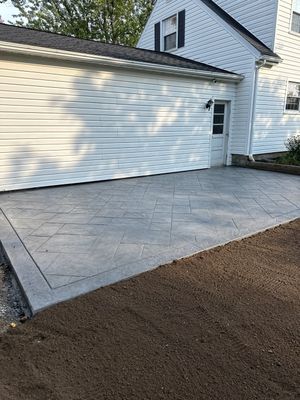 Majestic Ashlar stamped concrete patio with a border 