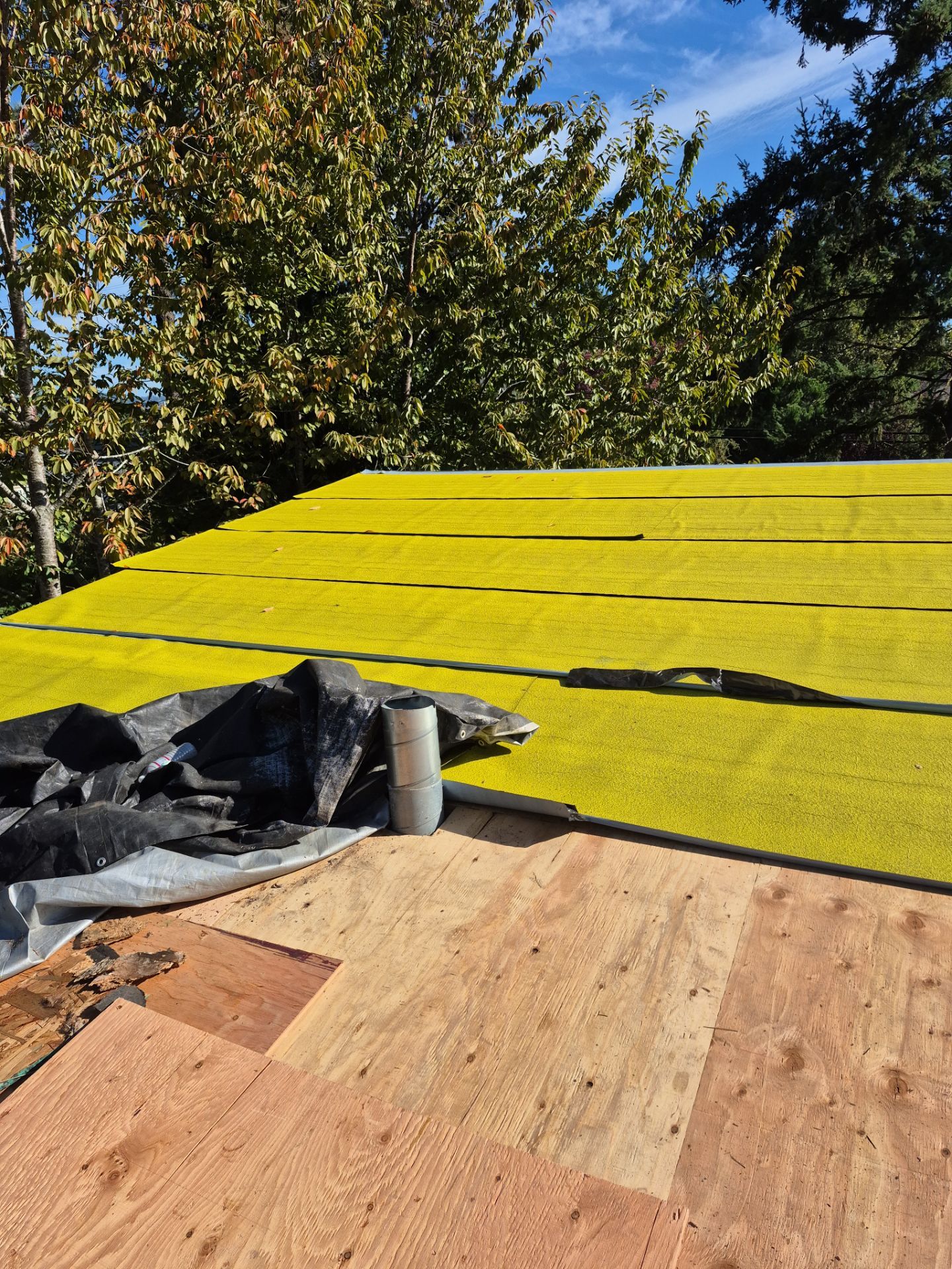 New Metal Roof and replace solar panels by Hawthorne General Construction