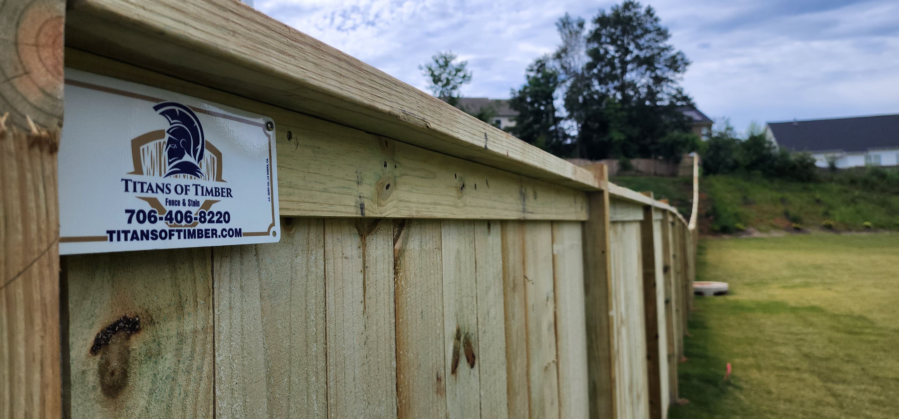 Fence Installation of Capped Wood Privacy by Titans of Timber Fence & Stain