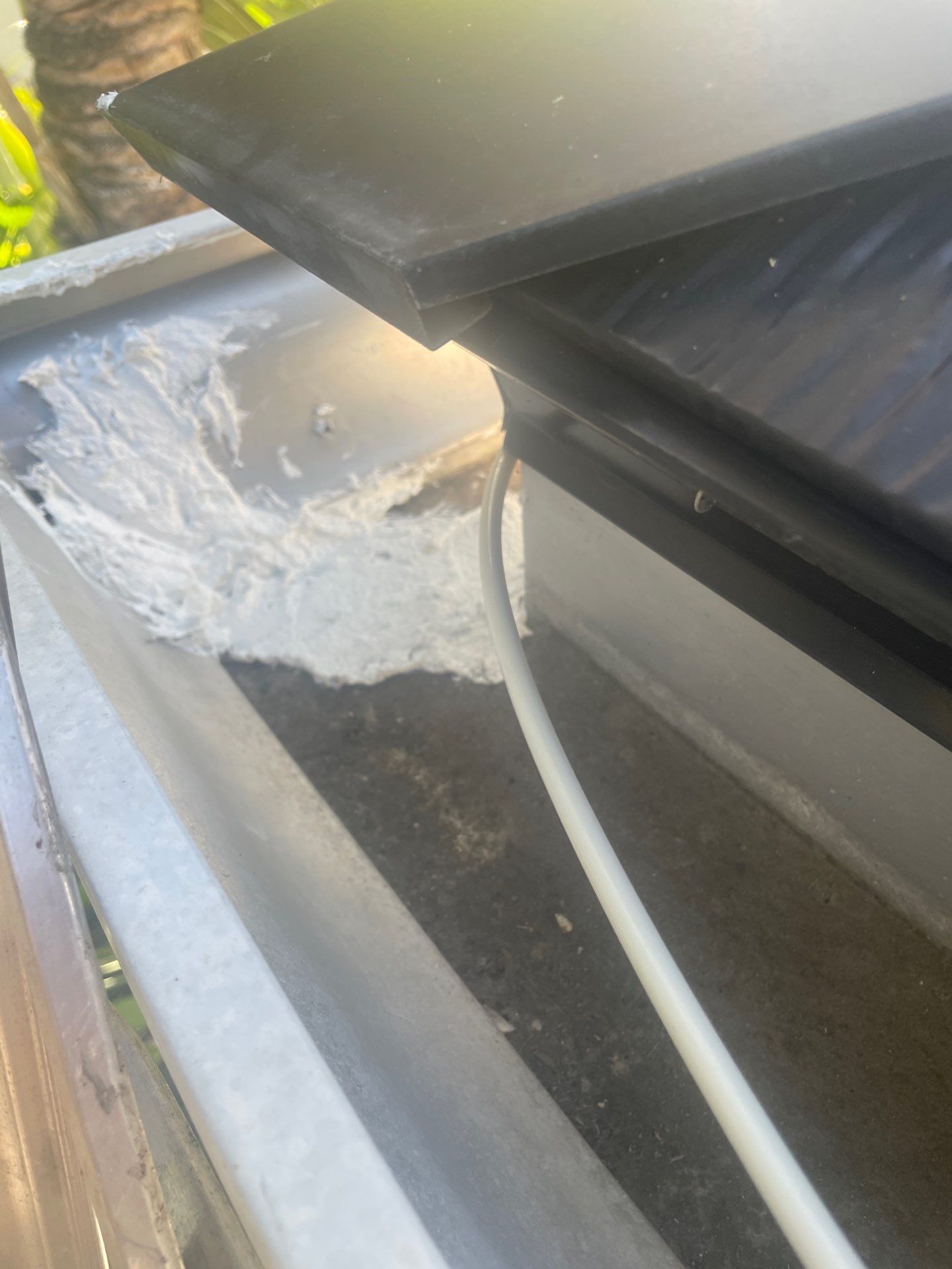 Cleaning Gutters in Sarasota FL by Gutter Professors