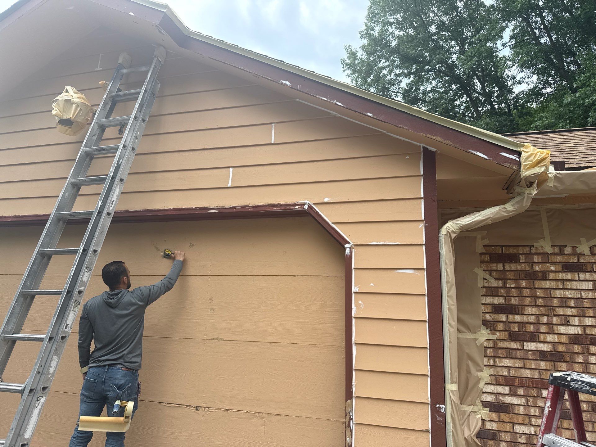 Exterior Painting on this Clarkston Home by Top Shelf Painter