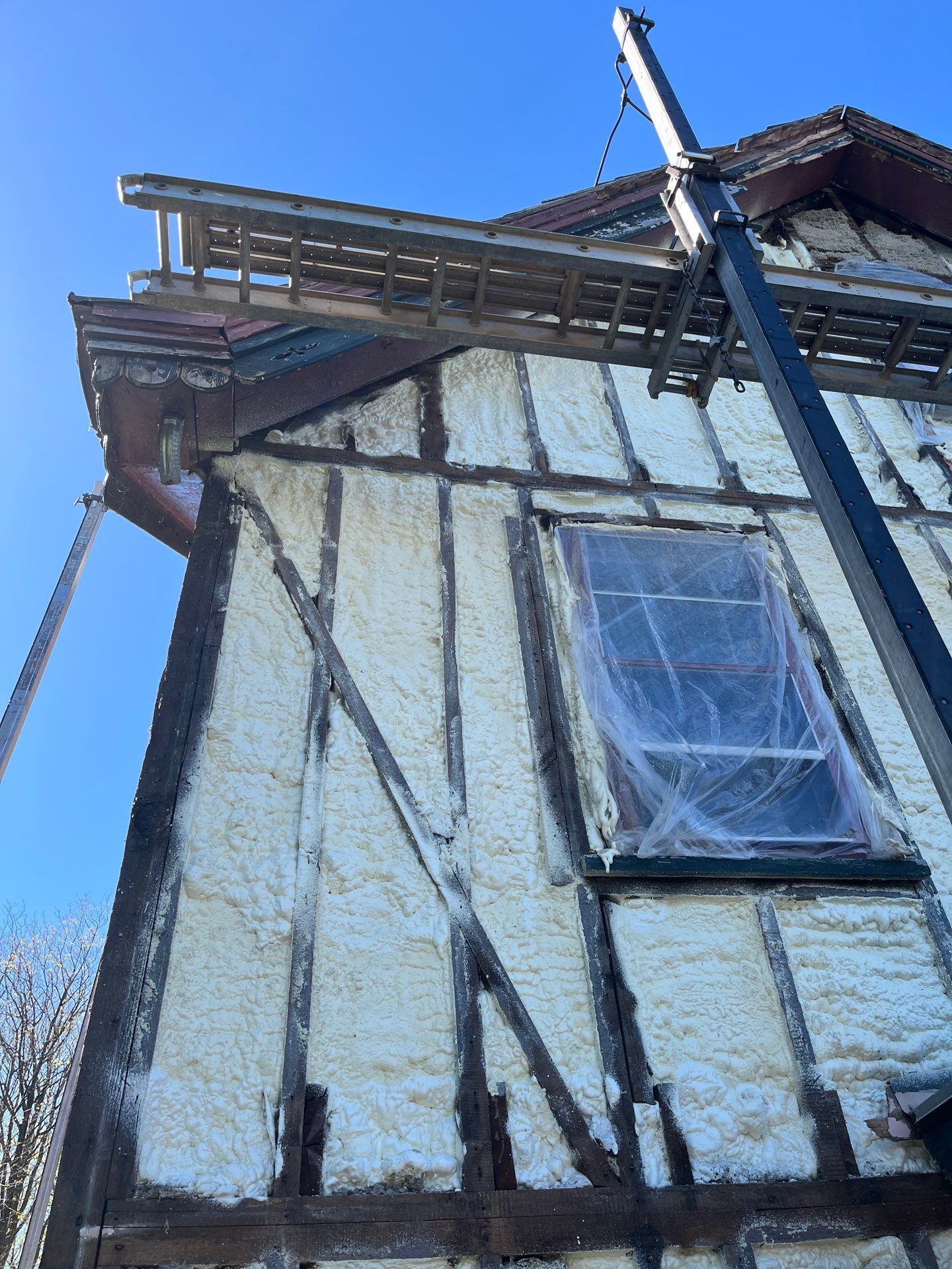 Siding Installation using Closed Cell Spray Foam by NYS Foam & Energy