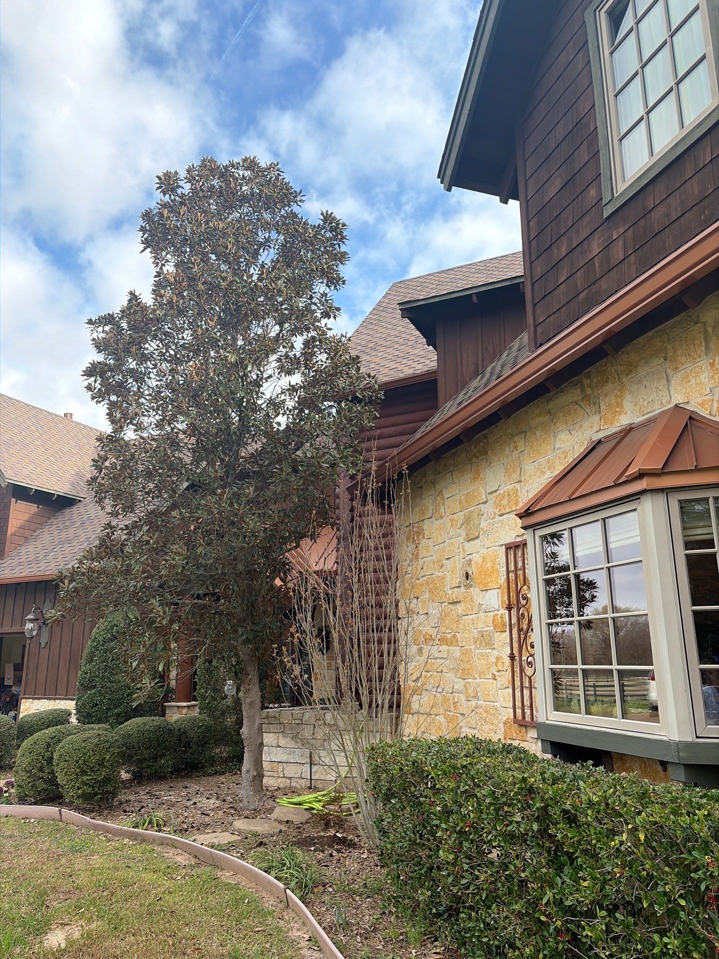 A Complete Exterior Refresh for a Custom Log Home & Property in Alba, Texas by Quality Coats Painting
