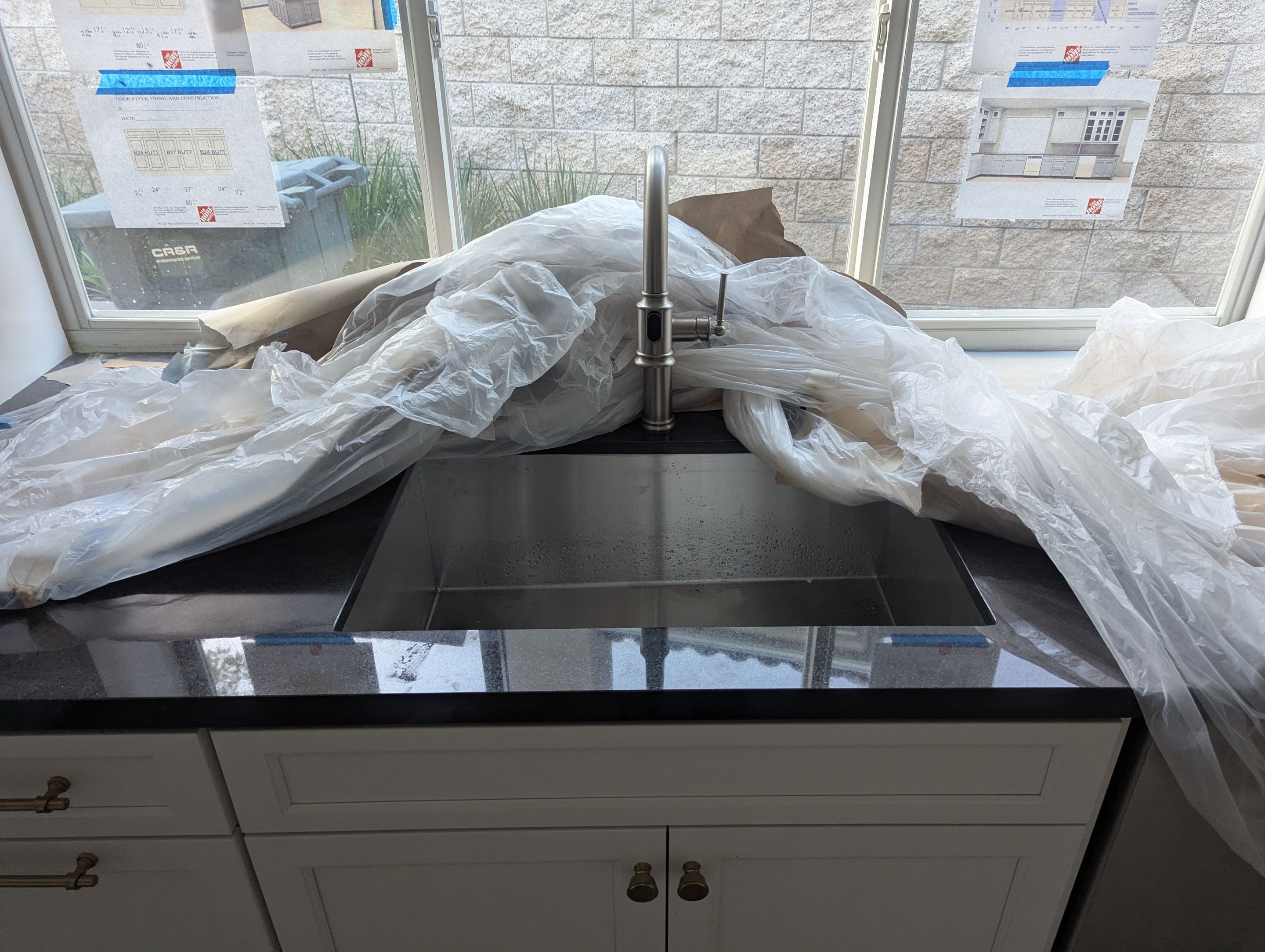 Setting Finish in a new Custom Home by Professional Plumbing Inc 