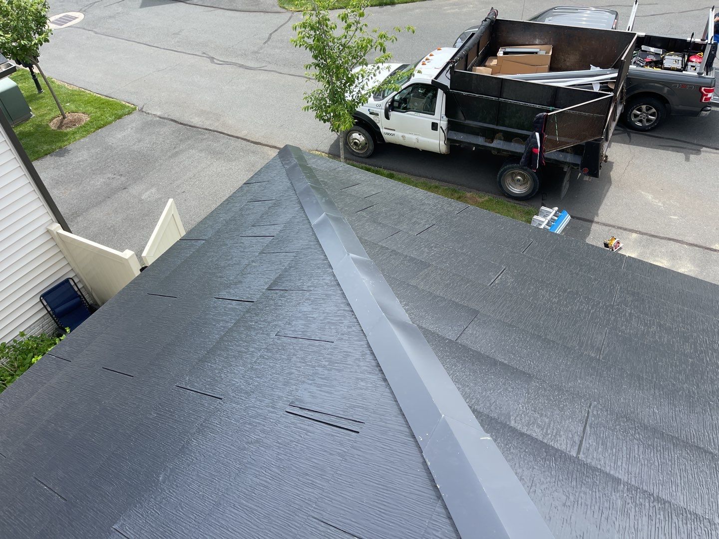Tesla Solar Roof using Tesla Solar Roof V3 tiles by American Home Contractors