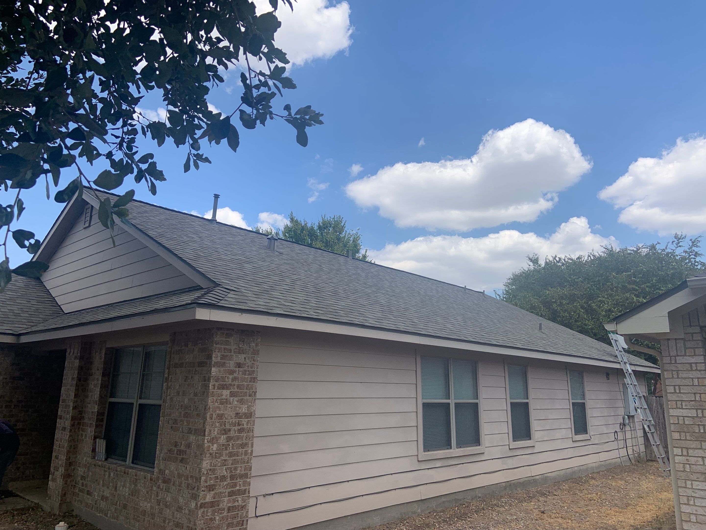 AMIG approved this roof for wind damage, fascia painting, and window work. by Roof Repair Company