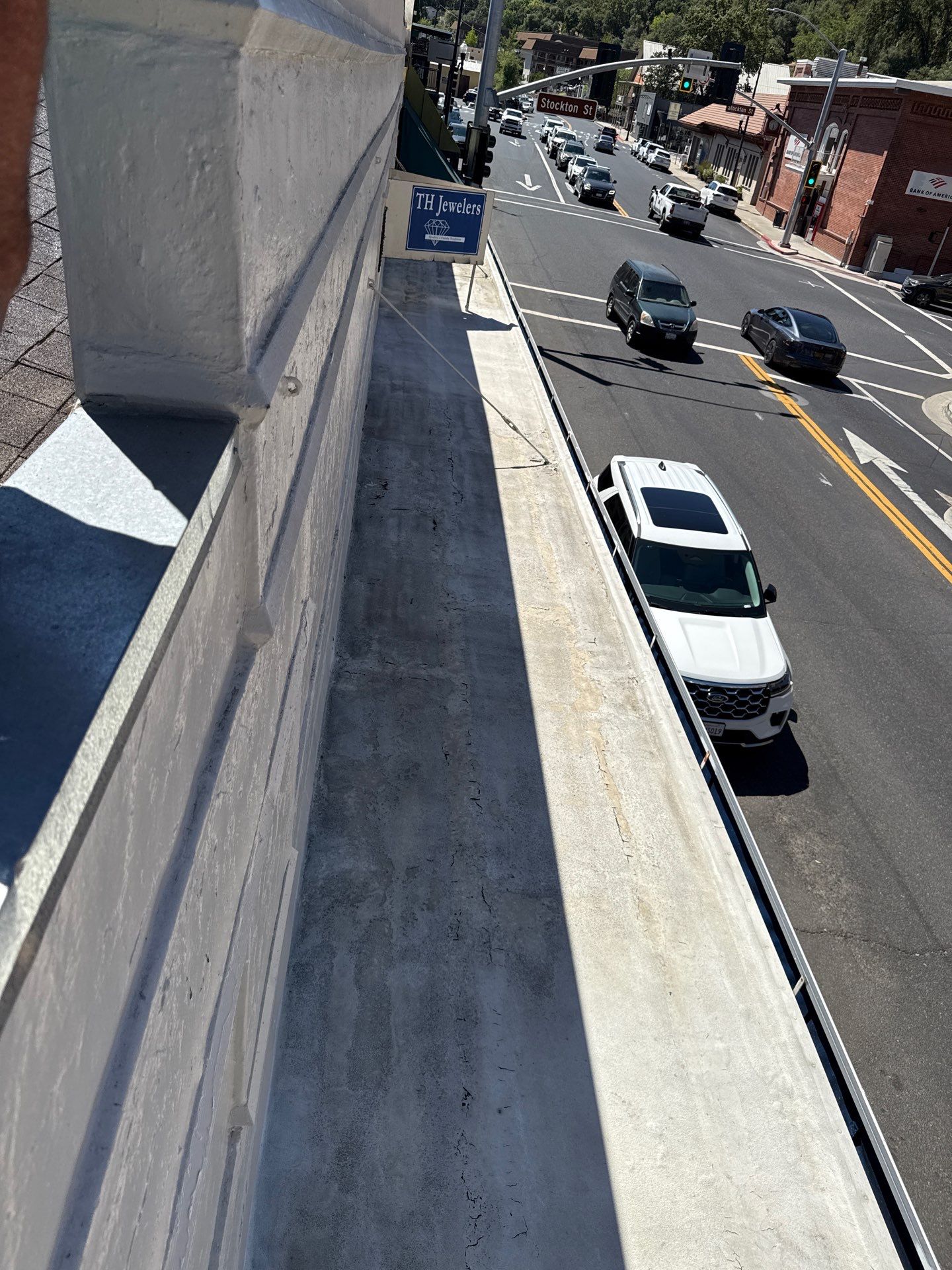 Foam and coatings on commercial roof by Straight Edge Roofing Inc