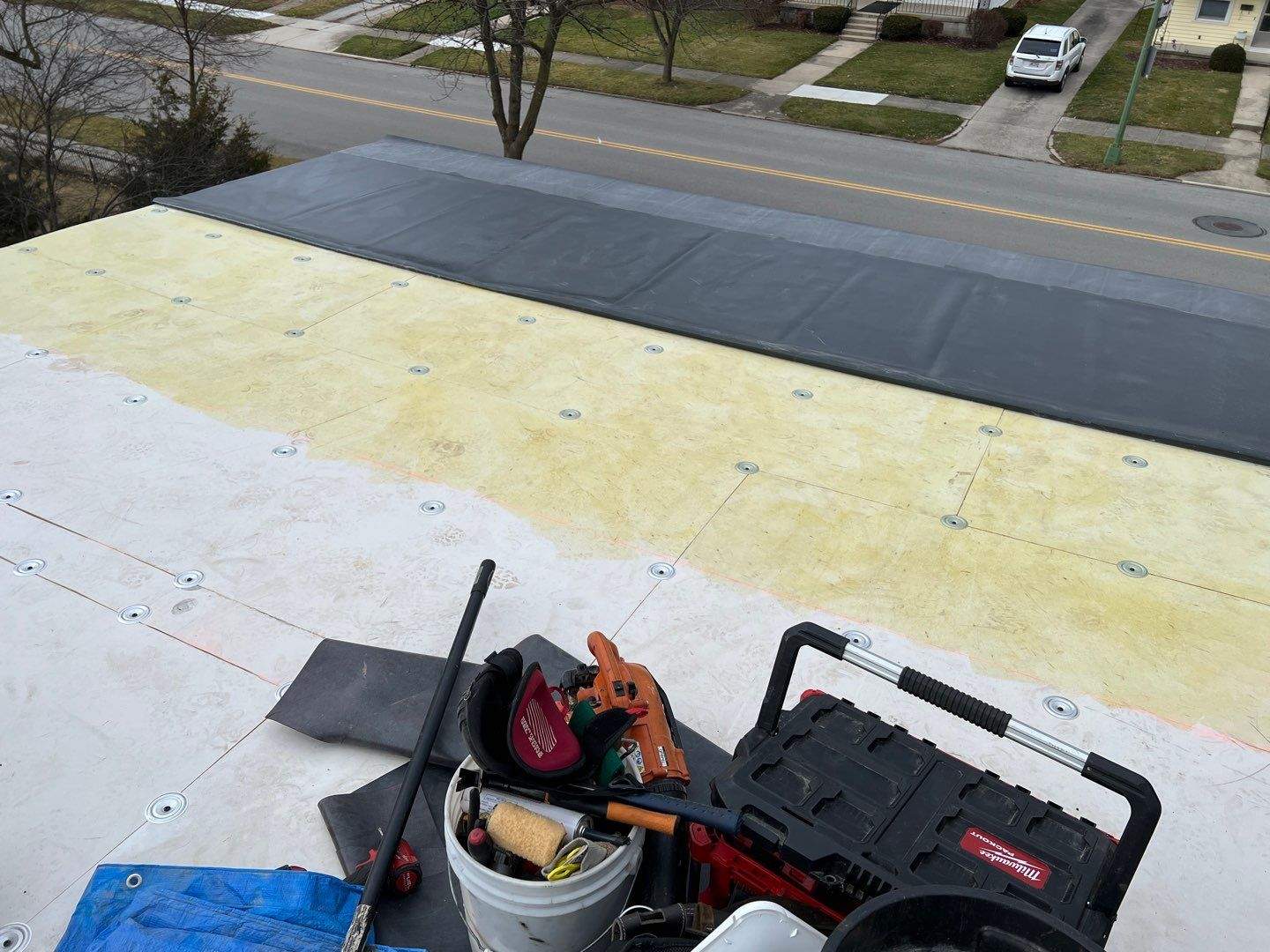 Residential Roofing Installation using 60 mil rubber roof by Nitro Roofing and Construction