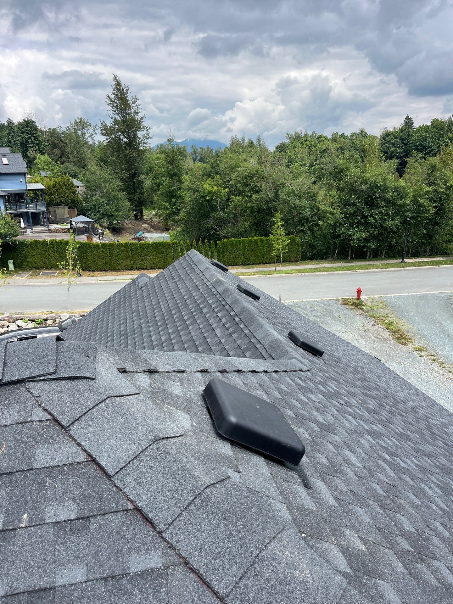 Residential Roofing Installation using GAF Timberline HDZ Charcoal by Top Notch Roofing Inc