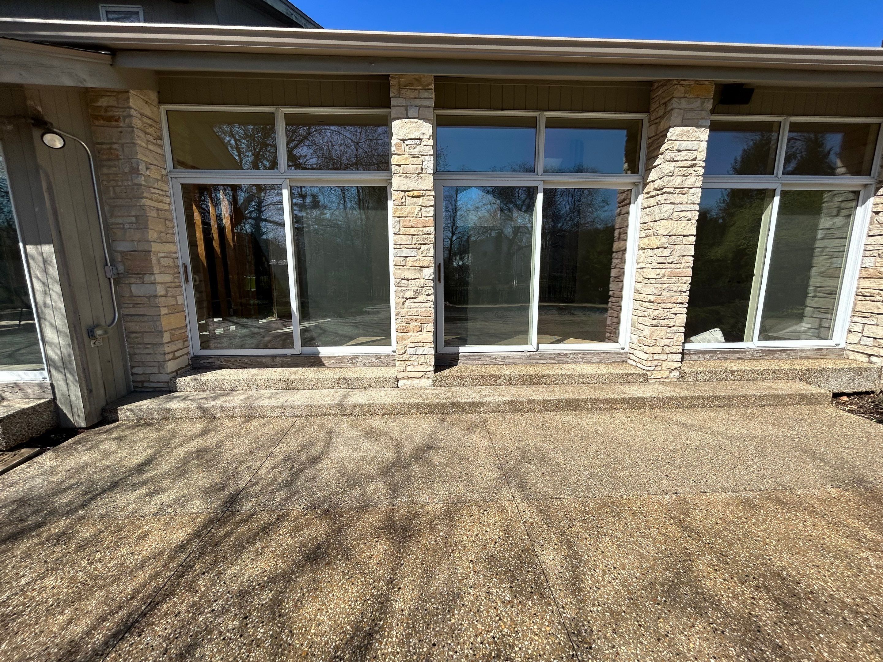 Aggregate Clean and seal using low gloss sealer by Northern Power Washing LLC.