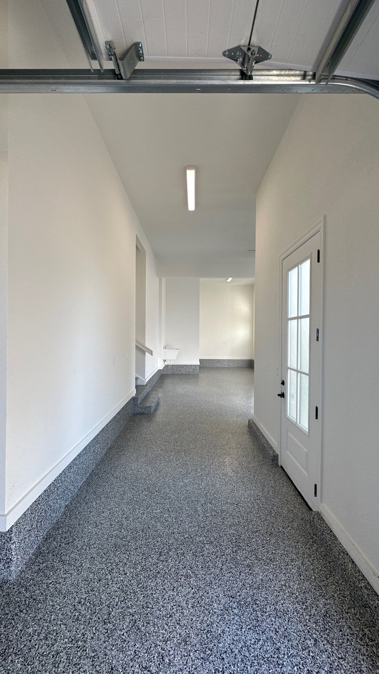 Mike & Pam transformed their garage with a Banner Garage Floor and Cabinets by Banner Garage