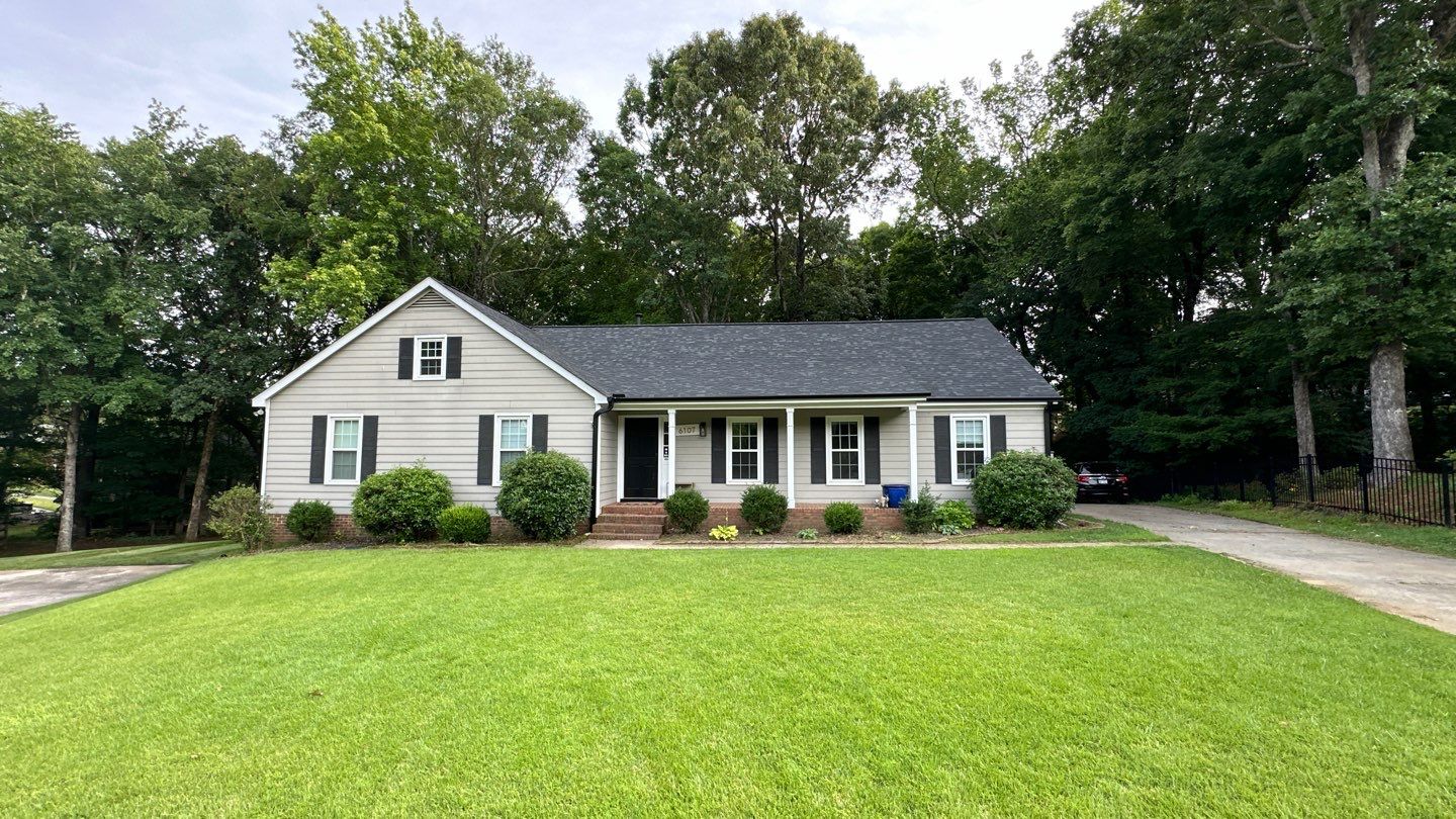Residential Roof Replacement and Gutter Installation in Charlotte, NC by Merritt Roofing LLC