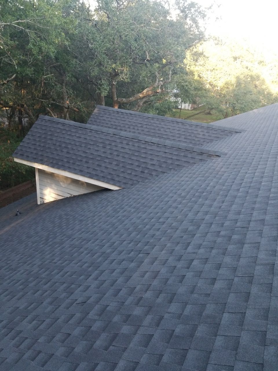 Residential Roofing Installation using Roof Replacement by American Roofing & Construction LLC