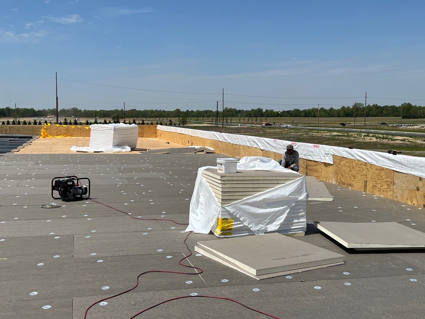 Commercial Roofing Installation using 60 mil rubber roof  by Nitro Roofing and Construction
