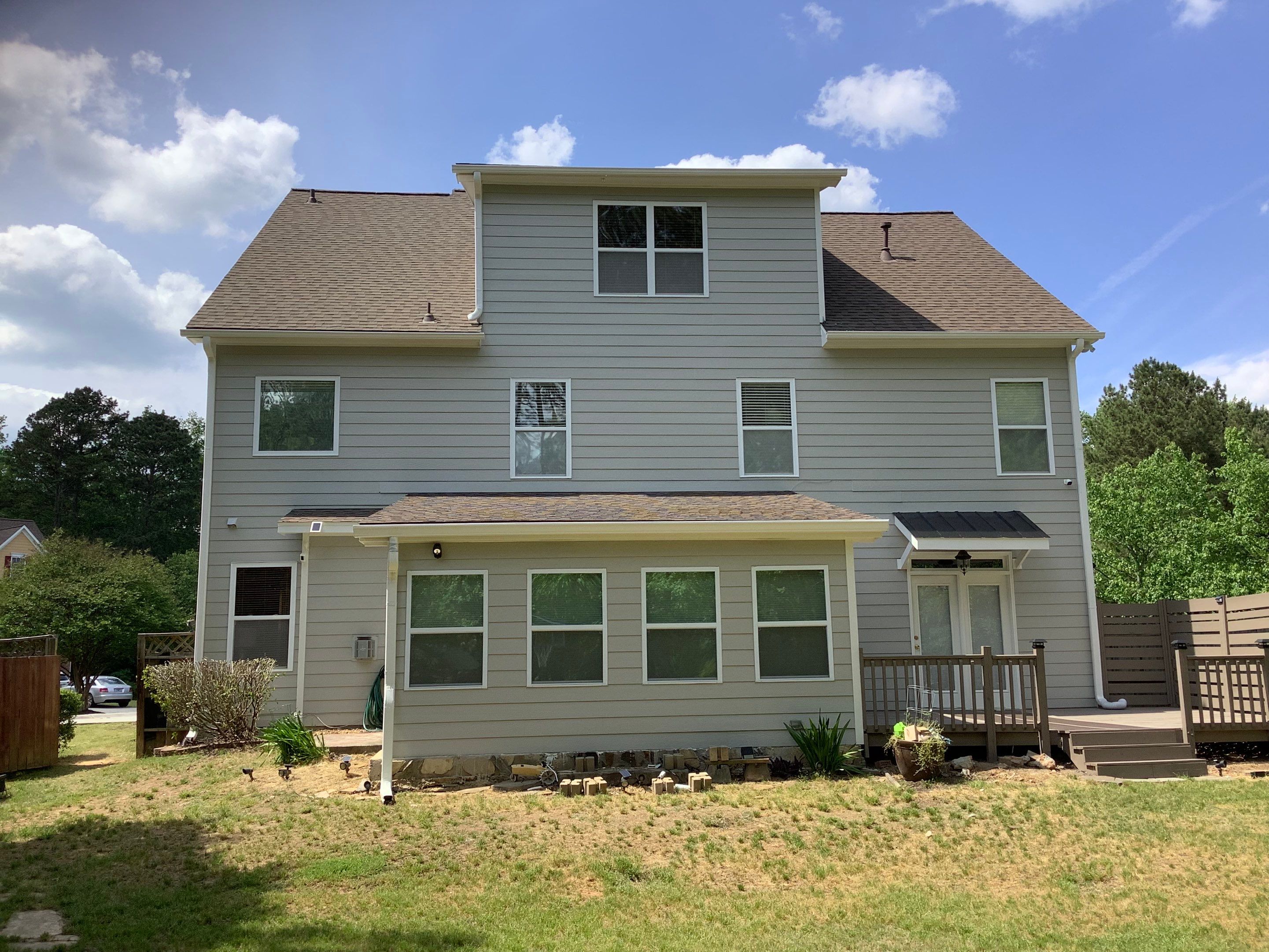 Exterior Home Refresh in Powder Springs with Gray Siding and White Trim by Swift Home Renovations
