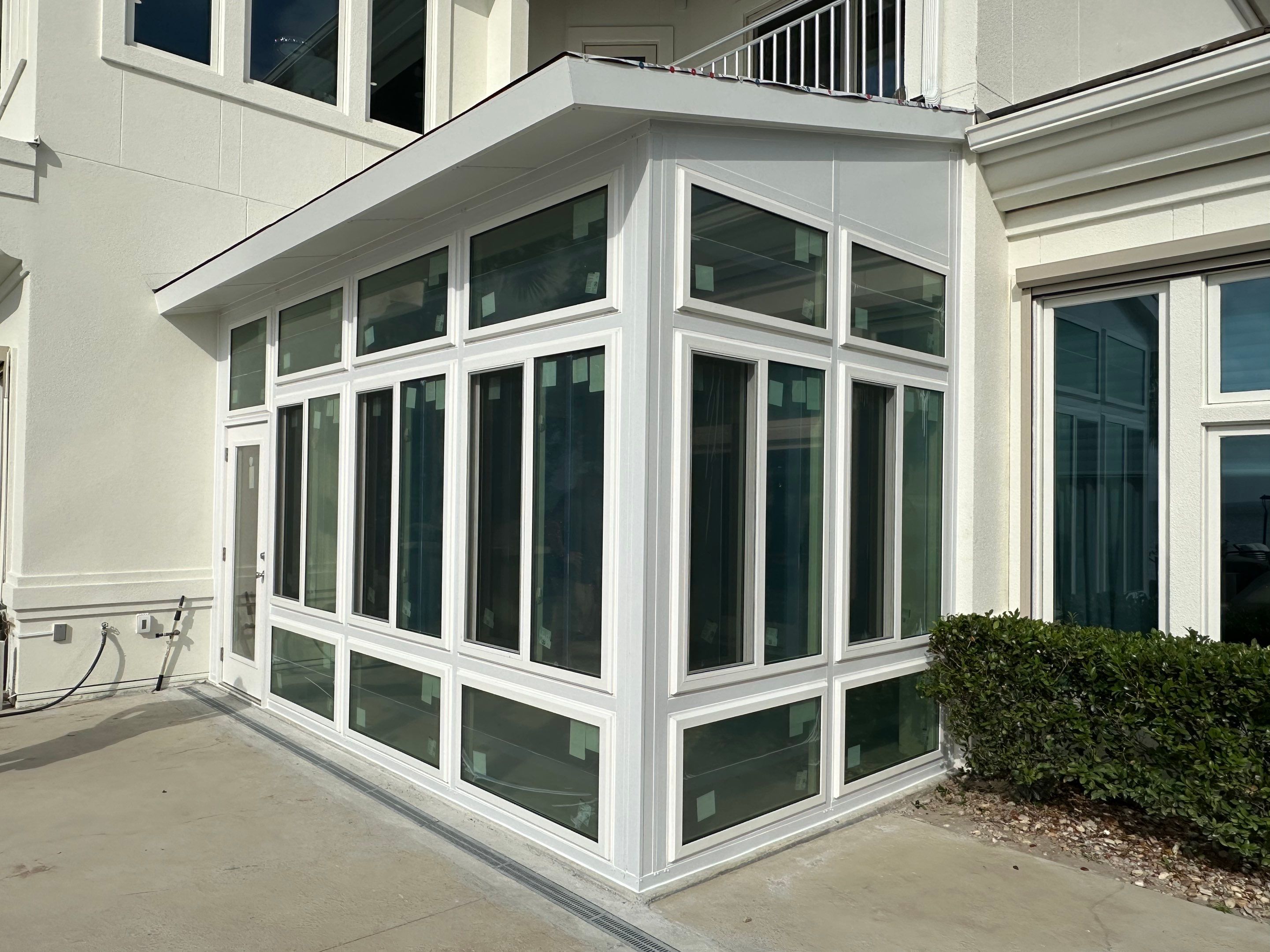 Miramar Beach Glass Room w/Hurricane Resistant Colorbeam by Titan Sunrooms