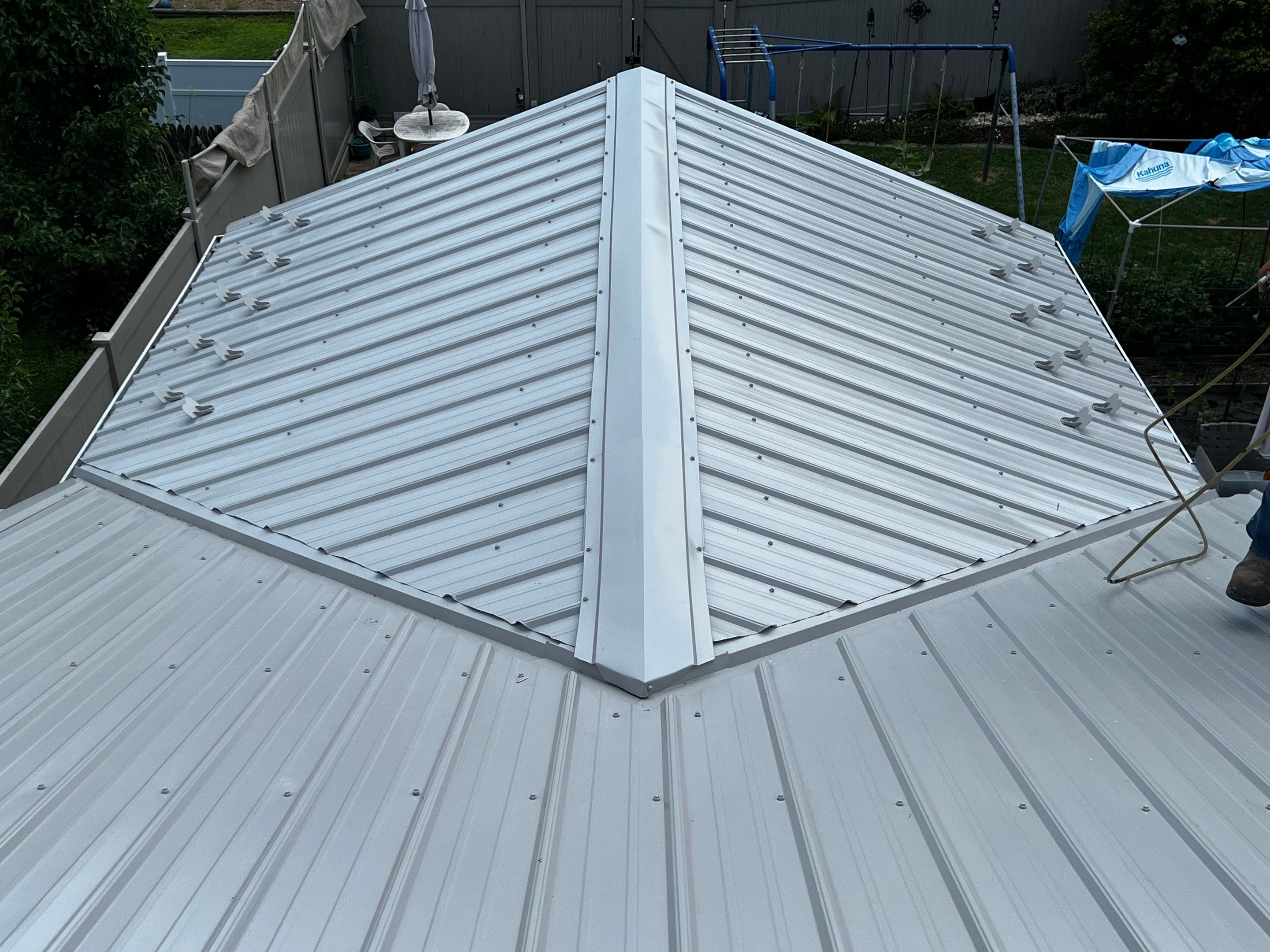 Metal Roofing, Skylights, Porch Build by Secure Construction Company Inc