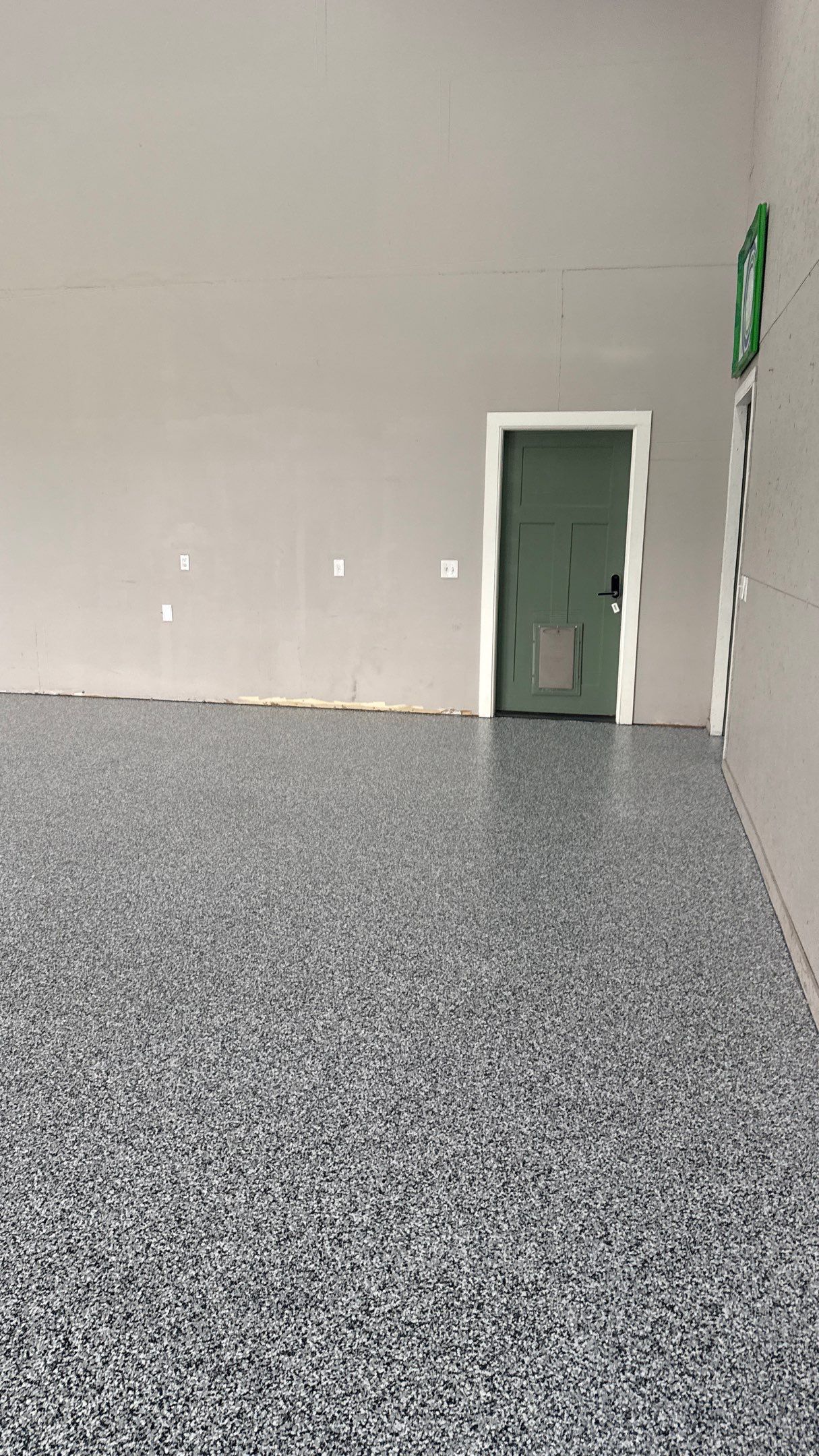 Domino Flake Floor Coating in De Soto by Banner Garage