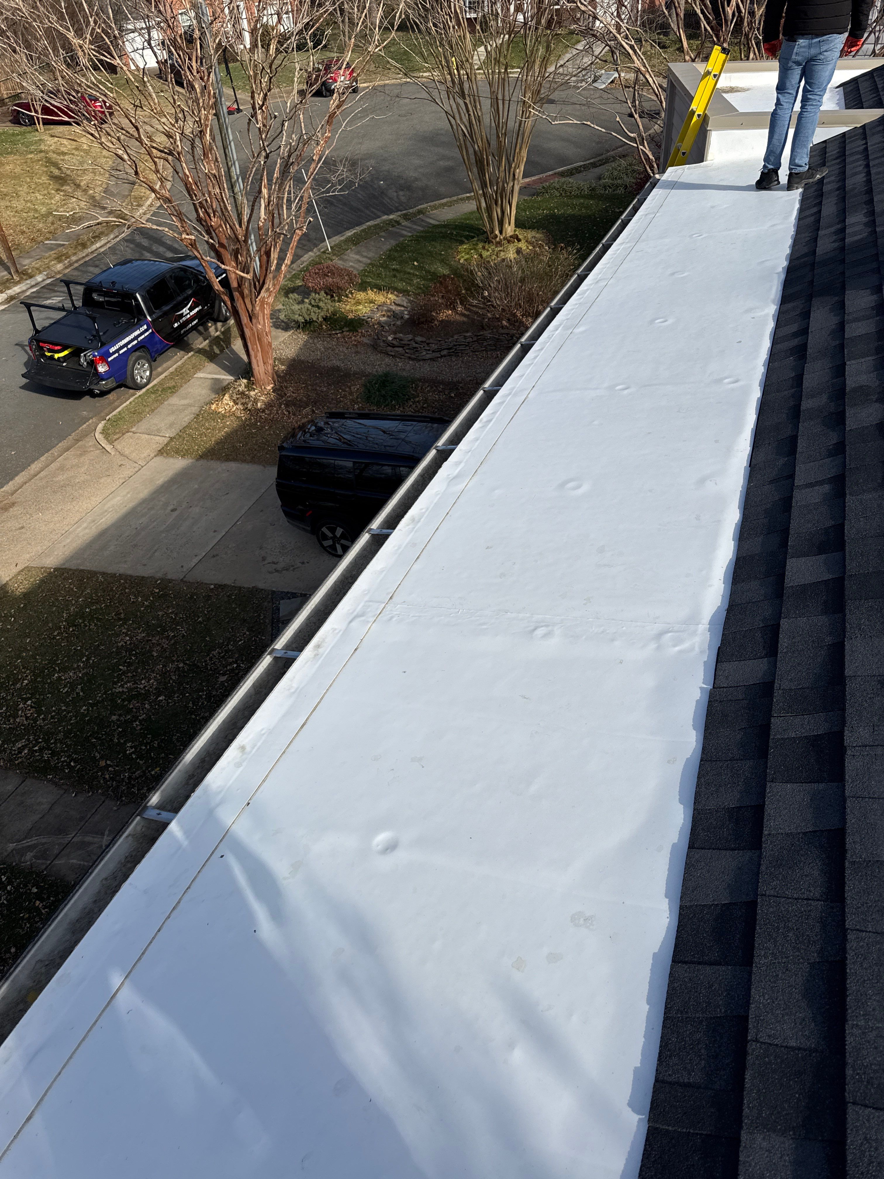 Residential Roofing Installation using Shingle and Flat Roof Combo by USA Storm Roofing and Construction Group