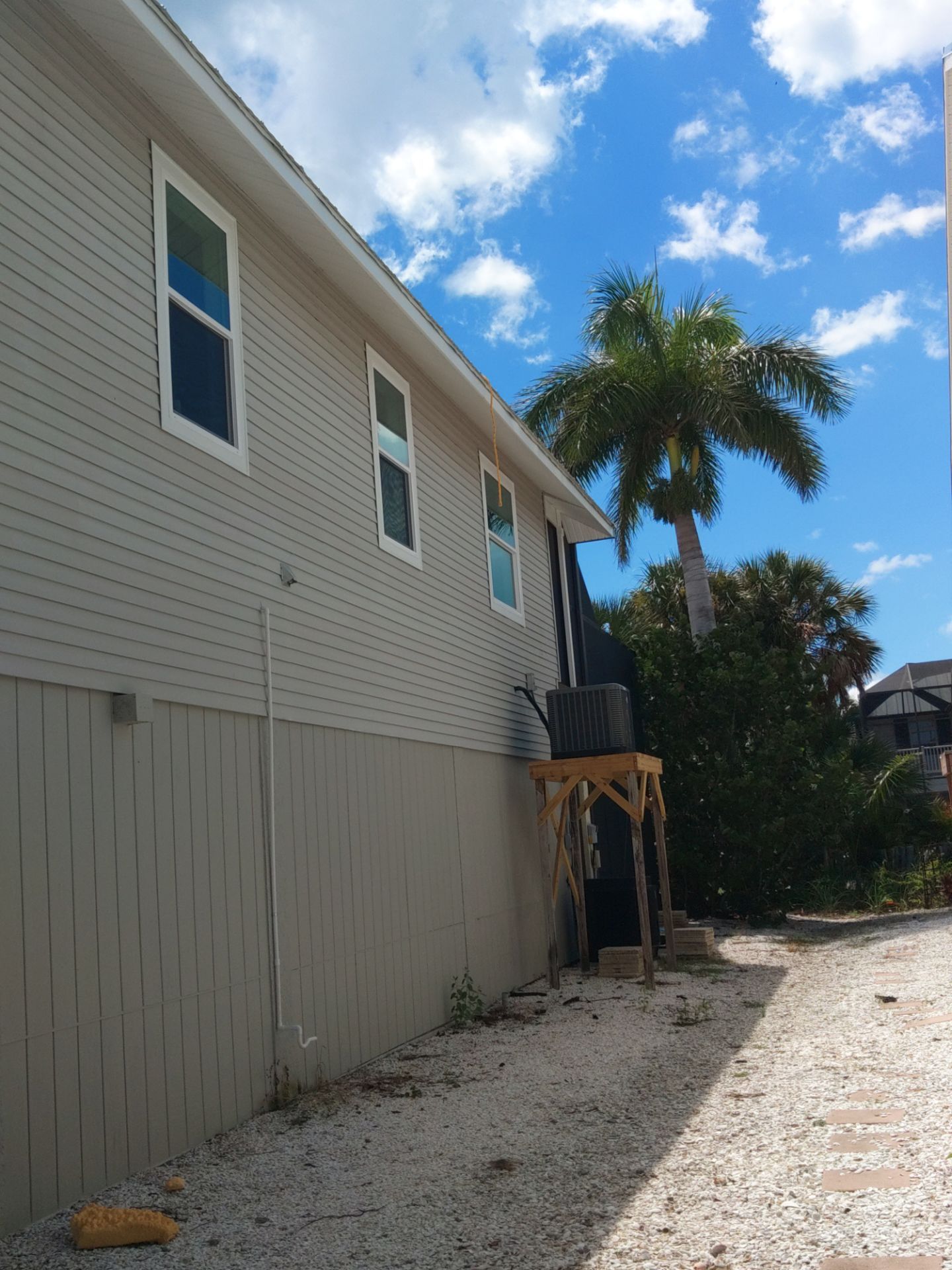 Complete Gutter System with Downspouts & Guards in Fort Myers Beach FL by Gutter Professors