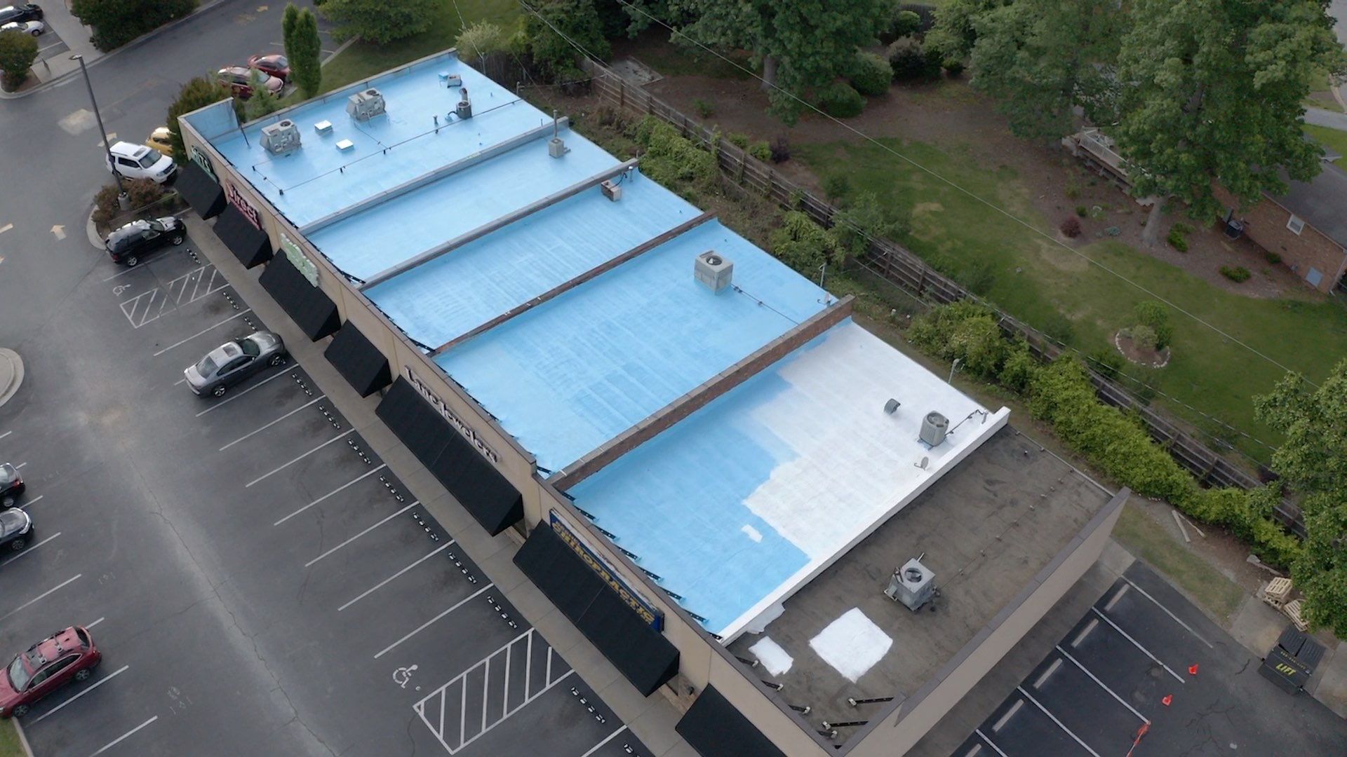Commercial Roof Coating using Fiberseal basecoat and Silicon Topcoat by Just In Time Roofing and Restoration