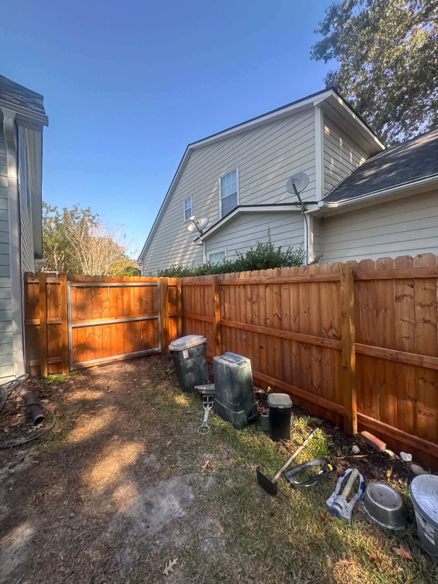 Weathered Fence and Patio using Wood Sealant and Concrete Sealant by DuraSeal