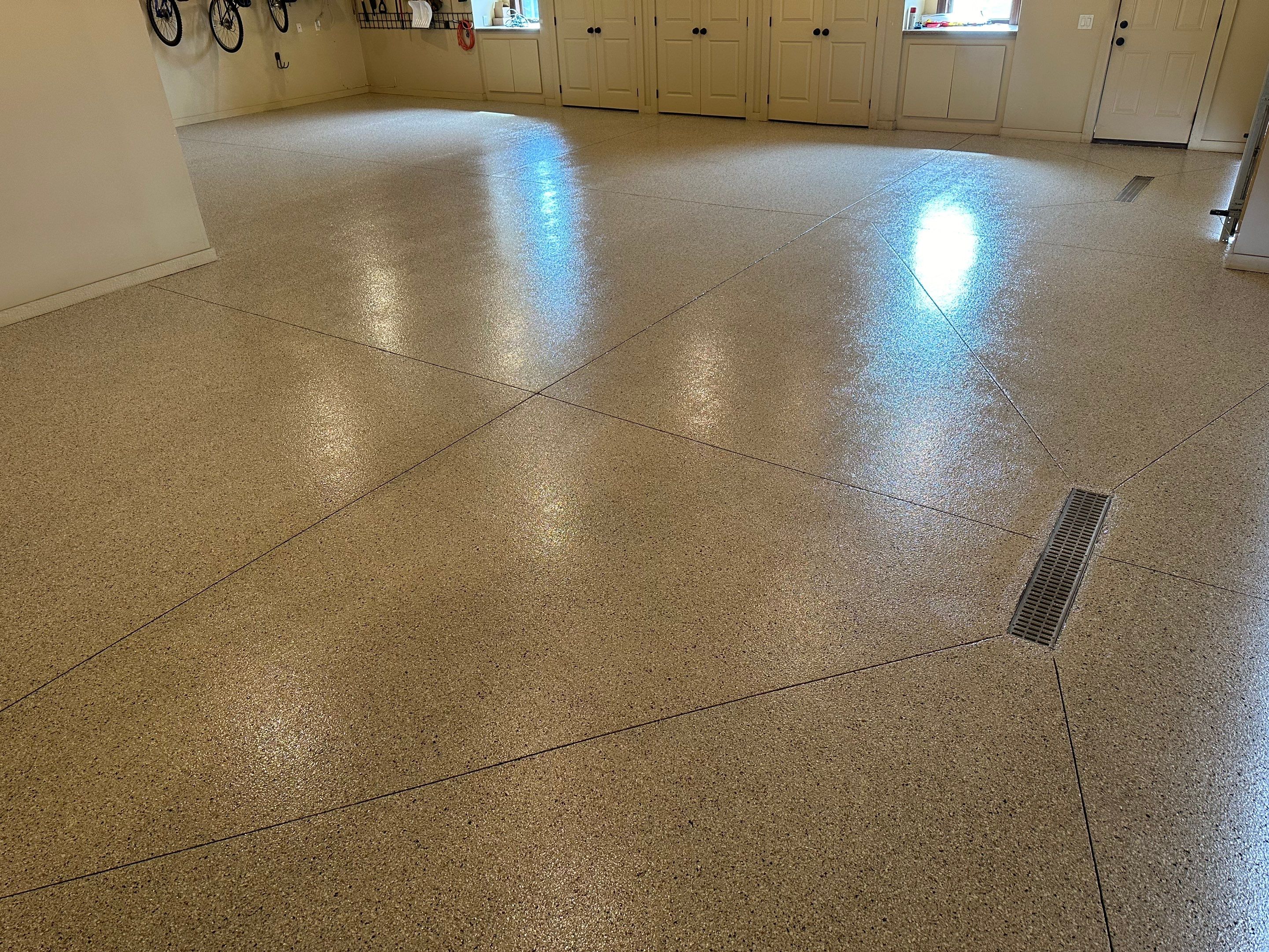 Sioux Falls Garage Floor Concrete Coating with Shoreline Flake Finish by Select Painting, Coatings & Garage Cabinets