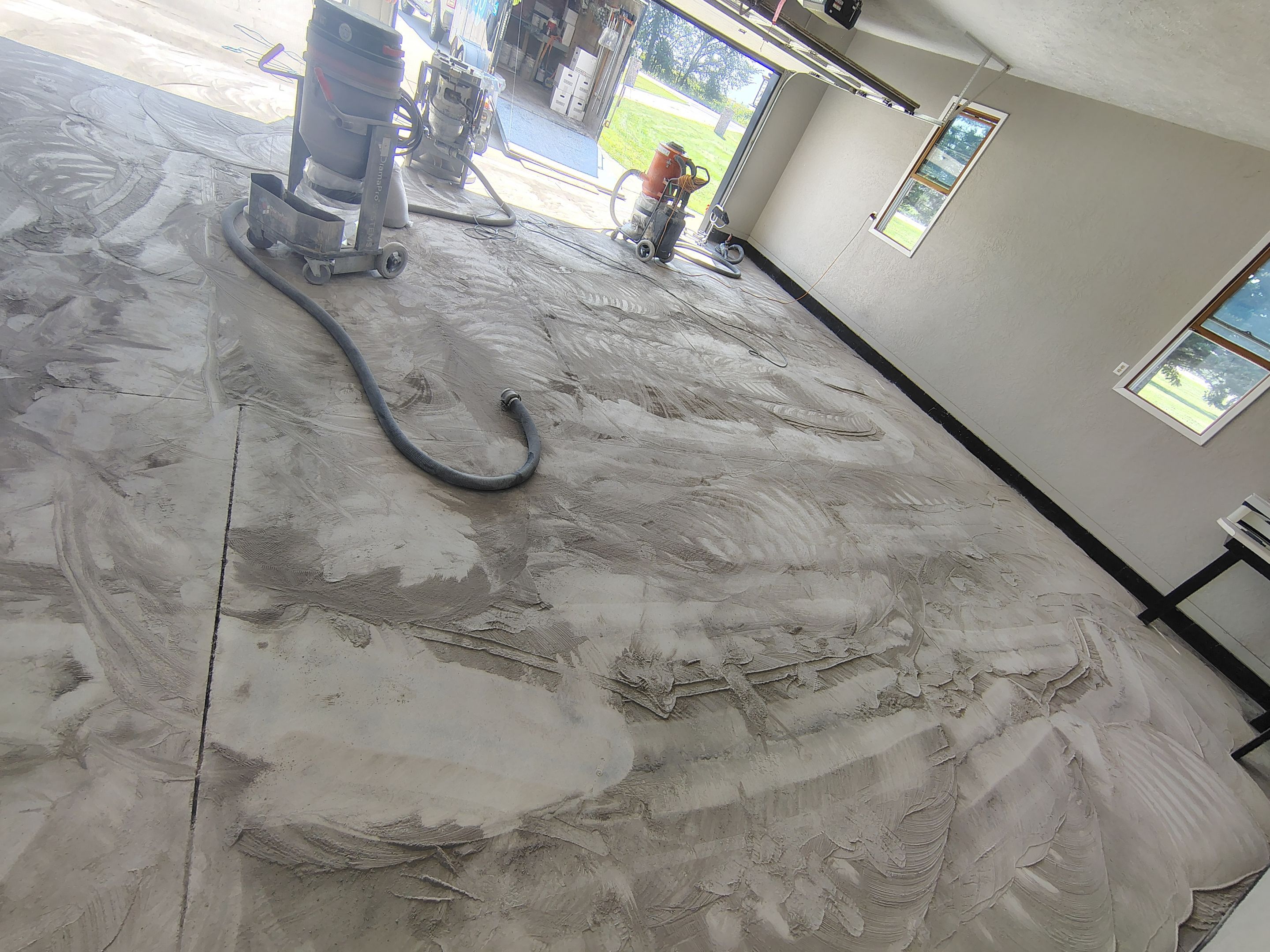 Garage Concrete Floor Coating and Crack Repair in Onawa by Select Painting, Coatings & Garage Cabinets