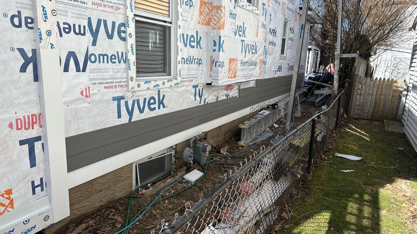 Siding Installation using Hardie Plank Aged Pewter by A Plus Exterior
