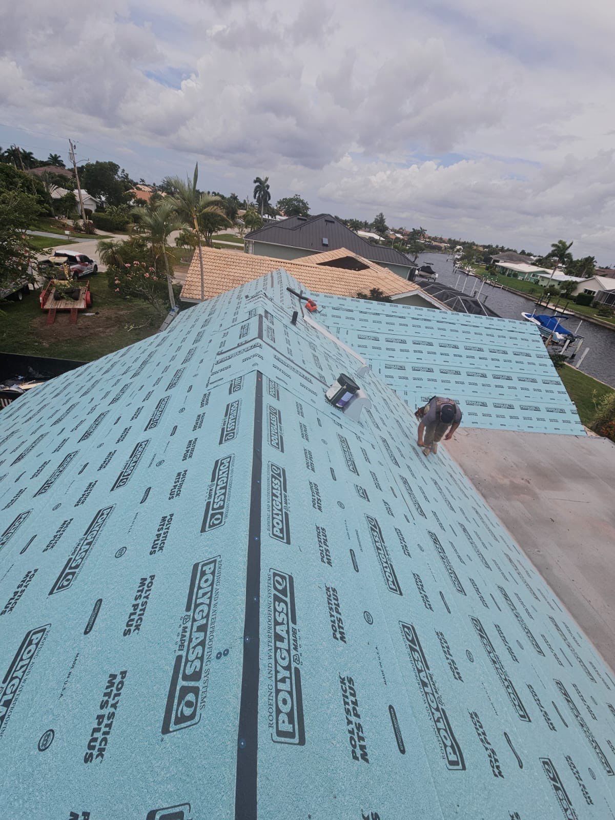 Residential Roofing Installation using Gulf Coast Metals Gulf Seam Panels by Four Peaks Roofing