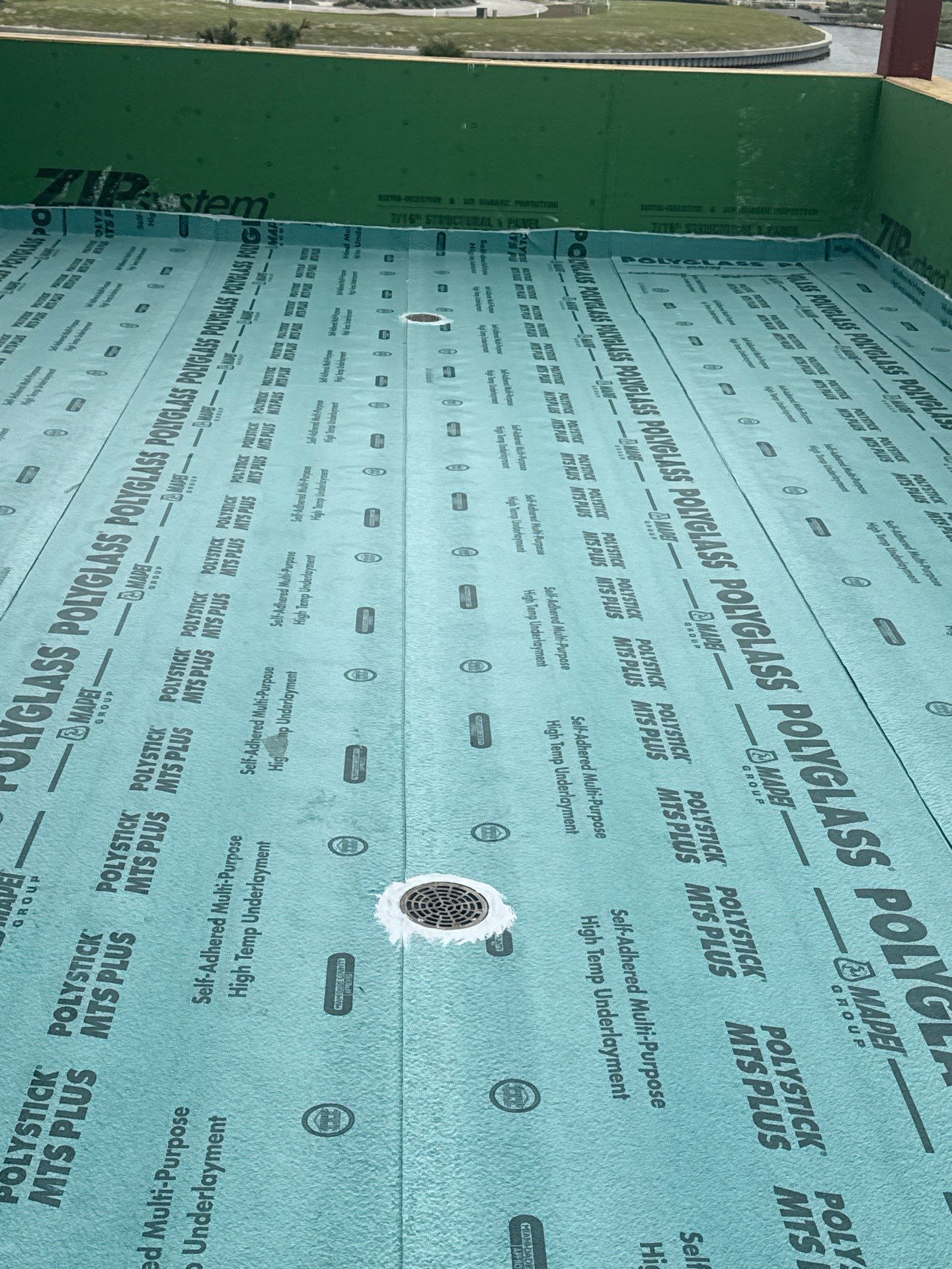 Walk Out, Island Style by Bayfront Roofing and Construction
