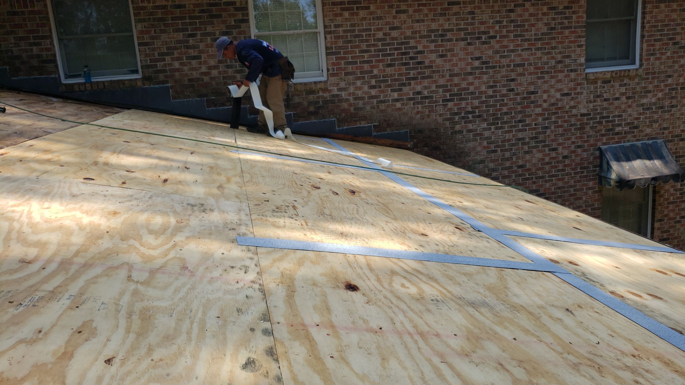 Residential Roofing Installation using Roof Replacement by American Roofing & Construction LLC