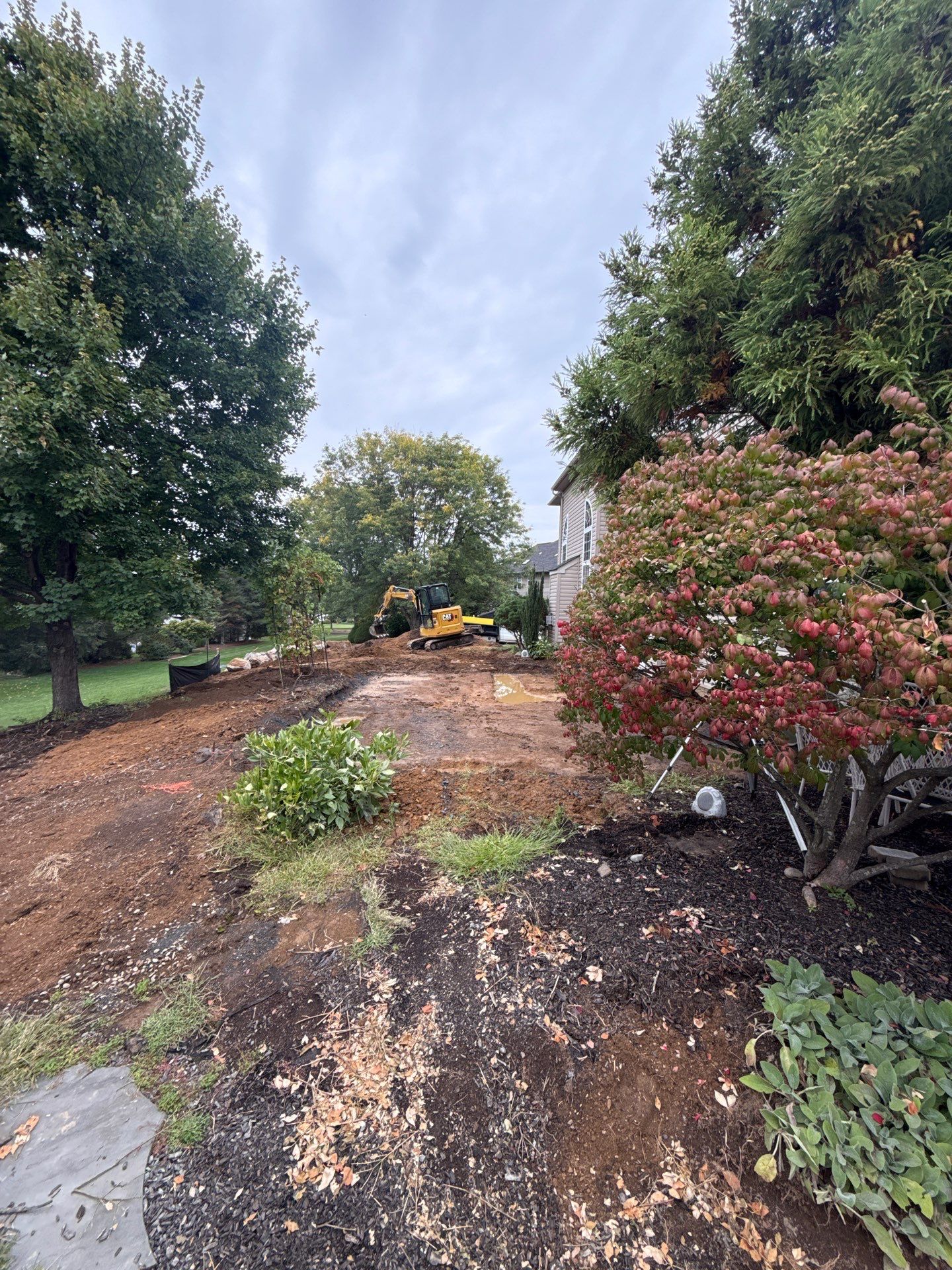 Backyard Retreat: Techo-Bloc Patio + Firepit Lounge by Saylor’s Lawn & Landscape