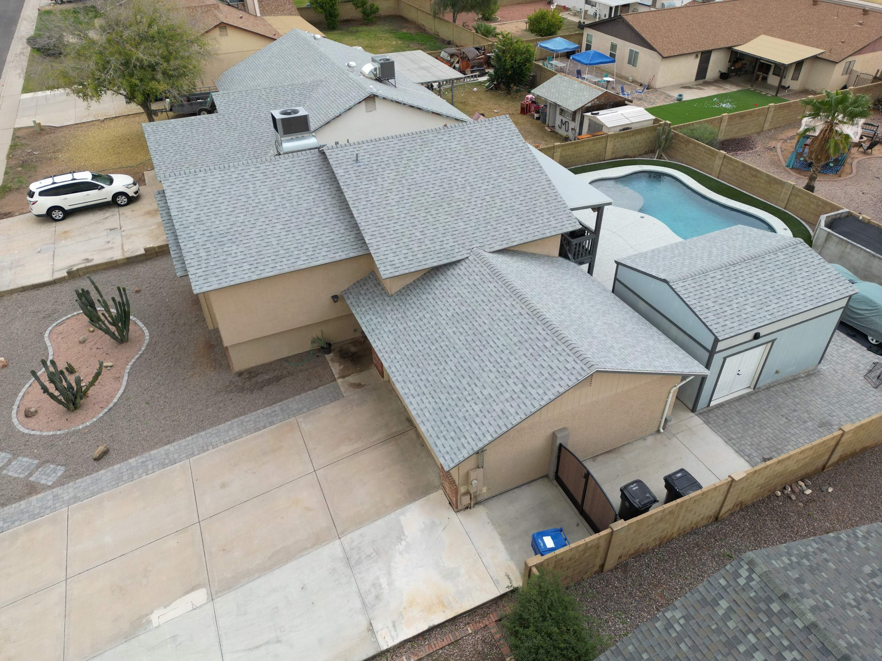 Anne's Full Re-Roof + Shed by All Storm Roofing & Construction