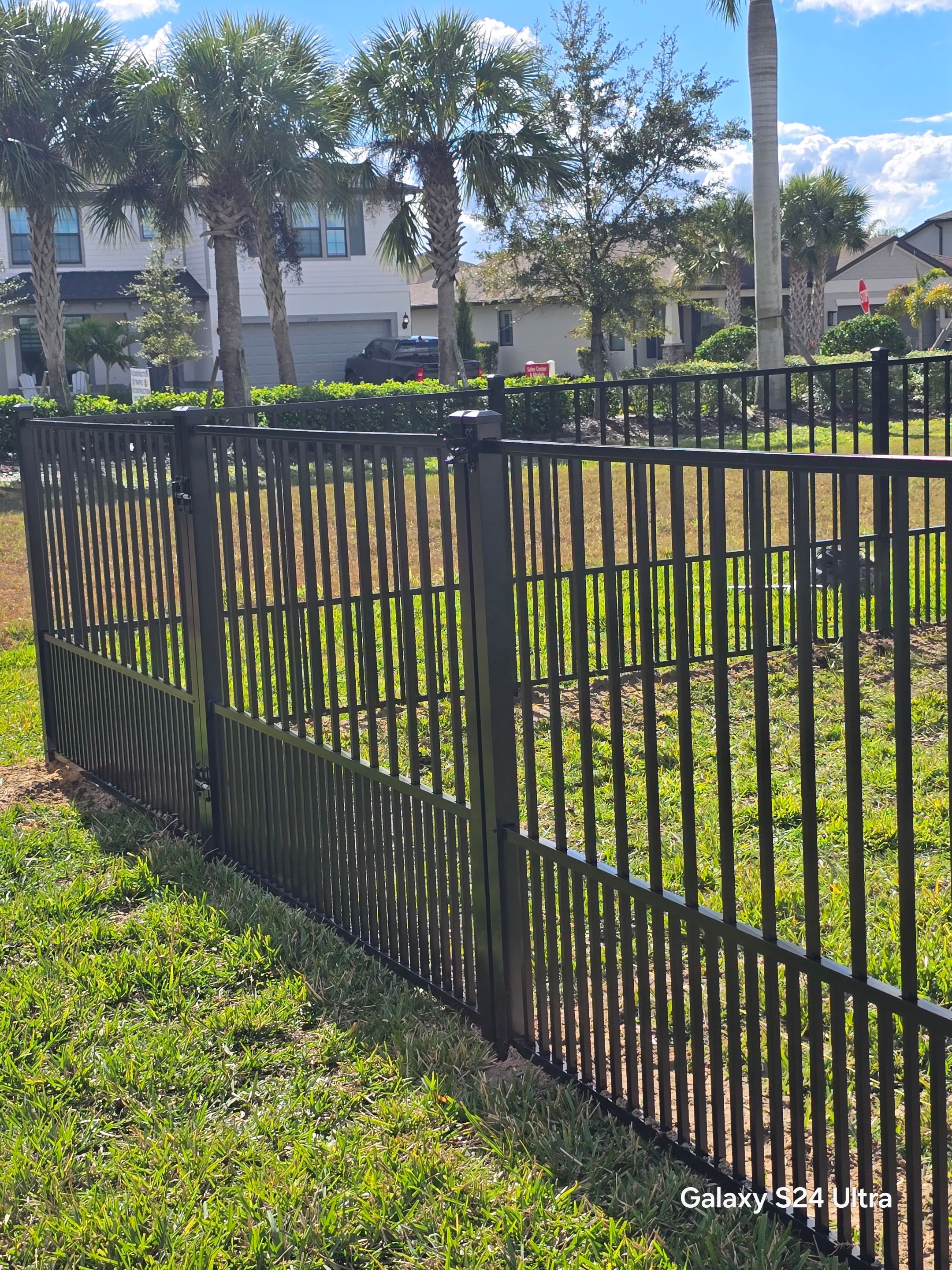 Puppy picket aluminum fence in North Port by True Fence LLC