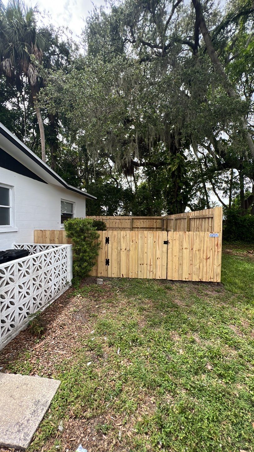 Wood Fence Installation using Board on Board Wood Fence by Asap fence and gates, LLC
