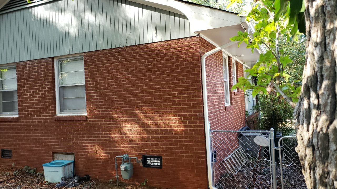 House Wash using cleaner by Power Wash Masters LLC