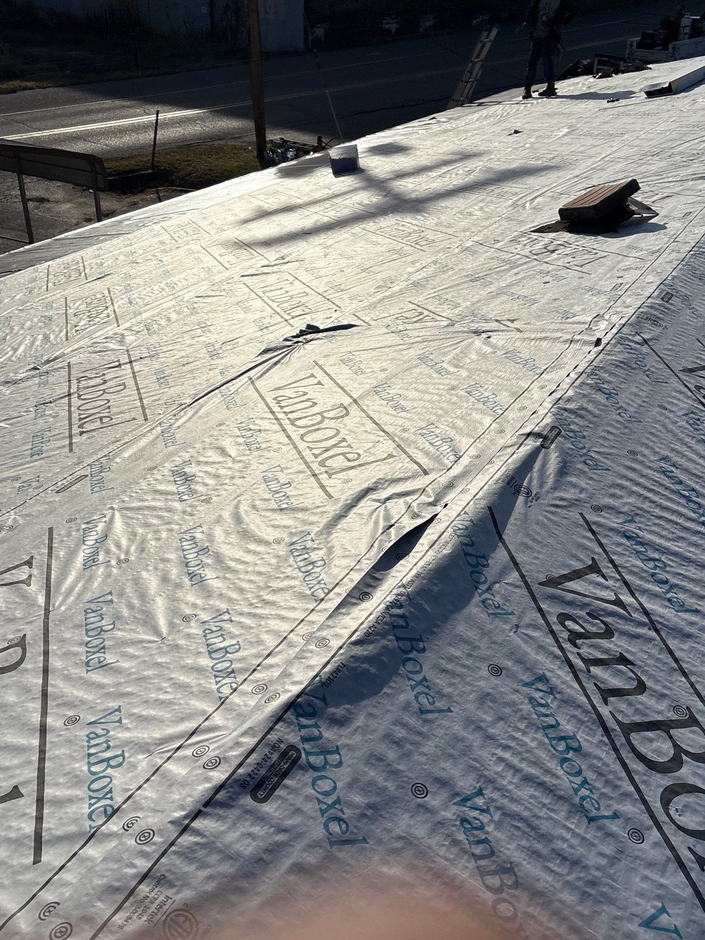 Commercial Roofing Installation using GAF Timberline HDZ Pewter Gray by Rainstoppers Roofing