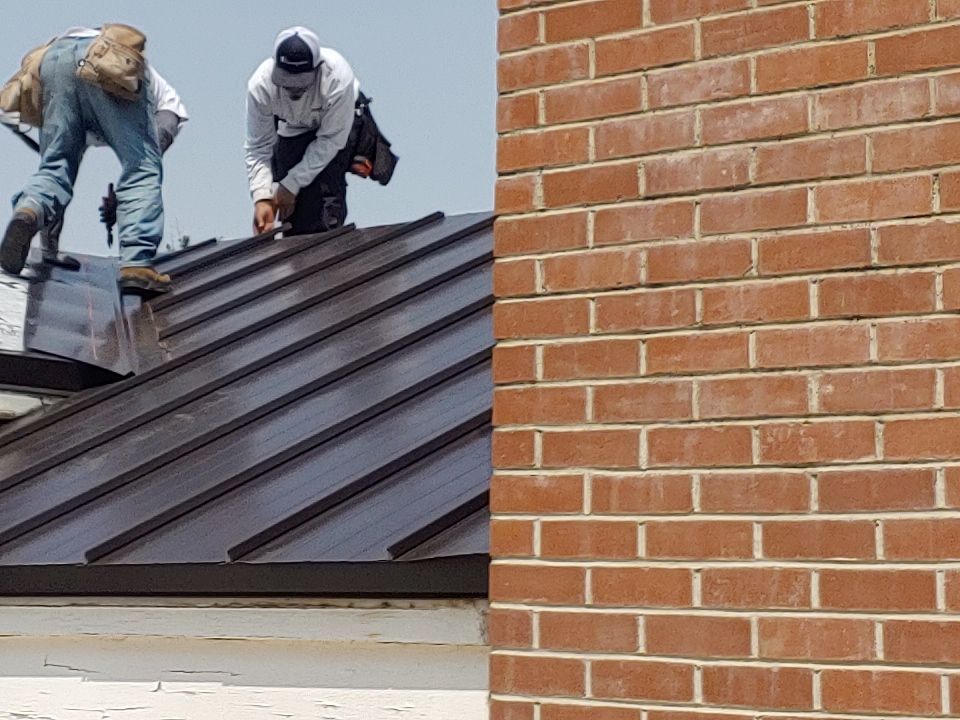 Residential Roofing Installation using Standing seam metal roofing system by Straight Edge Roofing Inc
