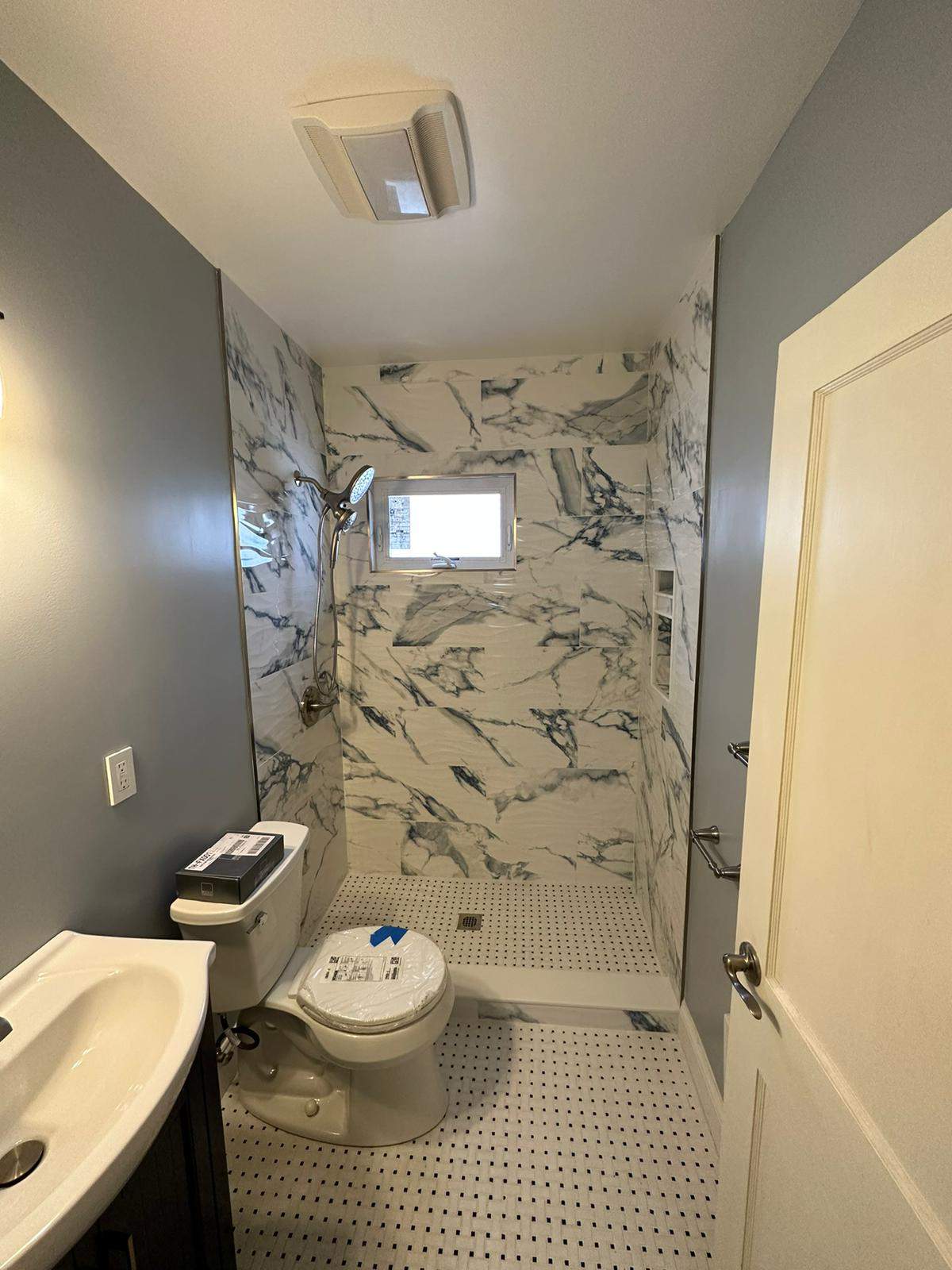 Bathroom Remodel using Tile by Home Concepts Construction