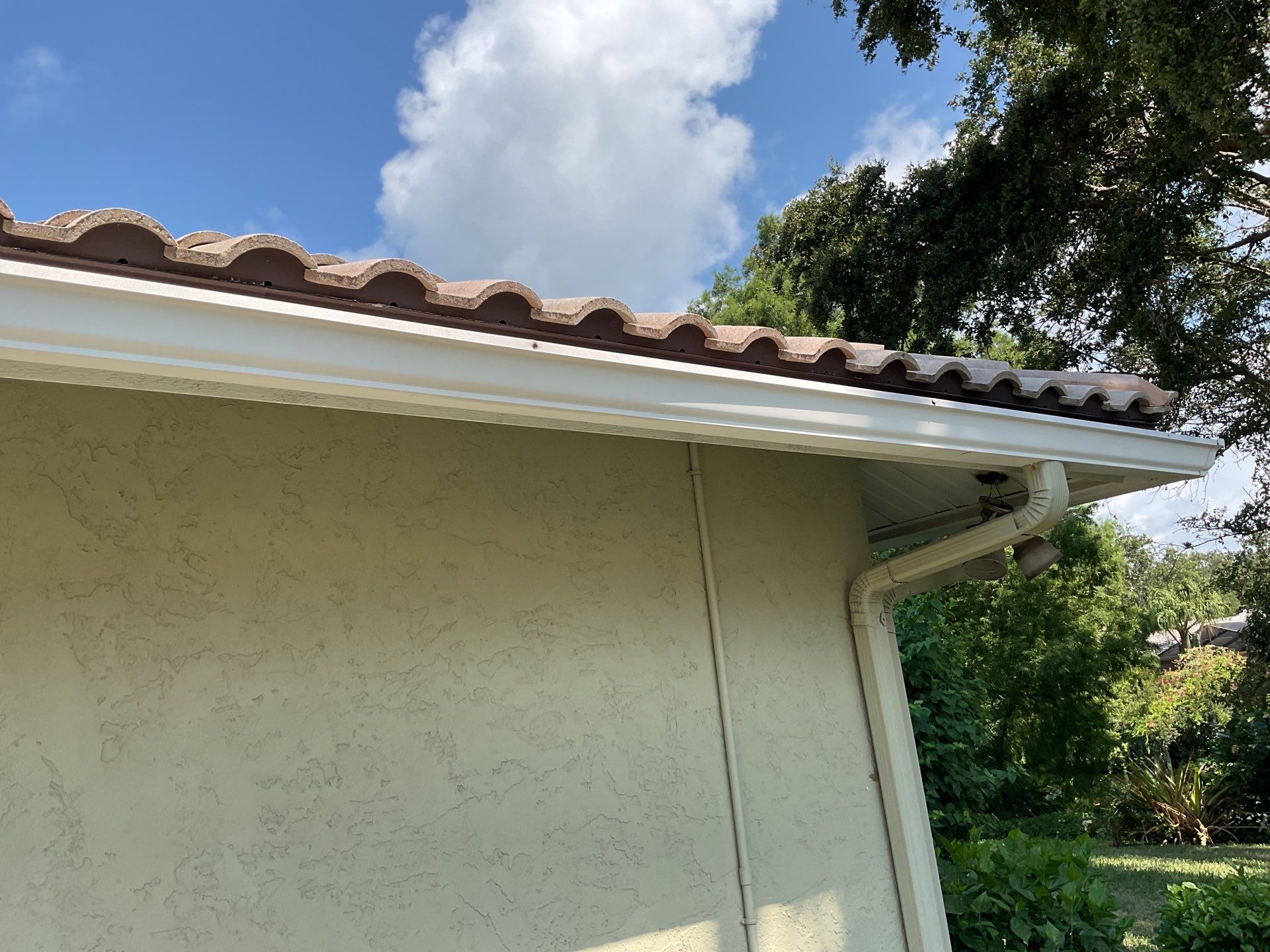 White Gutter Installation in Sarasota FL by Gutter Professors